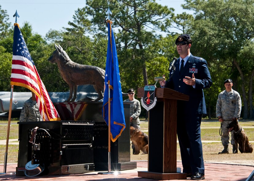 Maj. Michael Borders, 96th Security Forces Squadron commander, speaks to the crowd during the Military Working Dog memorial ceremony May 17 at the Air Armament Museum.  The ceremony honored MWDs and civilian K-9 unit for their service and remembered those who’ve fallen.  The ceremony was just one of the events happened for Police Week.  (U.S. Air Force photo/Samuel King Jr.)    

 
