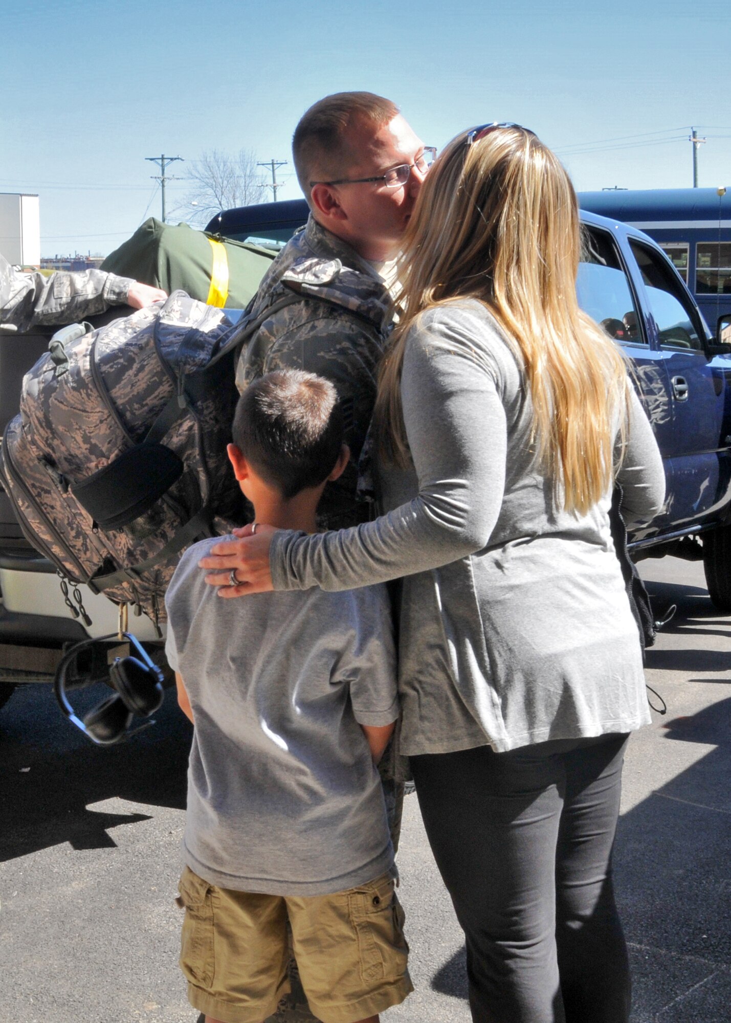 Members of the 30th Aerial Port Squadron say goodbye to friends and family as they prepare for deployment, May 09, 2011, Niagara Falls Air Reserve Station, NY. Airman from the 30th APS are slated to perform duties such as aircraft passenger processing, loading and unloading both military and civilian aircraft, load planning and building air drop platforms for airdropping food, water, ammunition and medical supplies which is a vital resource to Service members stationed in remote areas. (U.S. Air Force photo by Staff Sgt. Joseph McKee)
