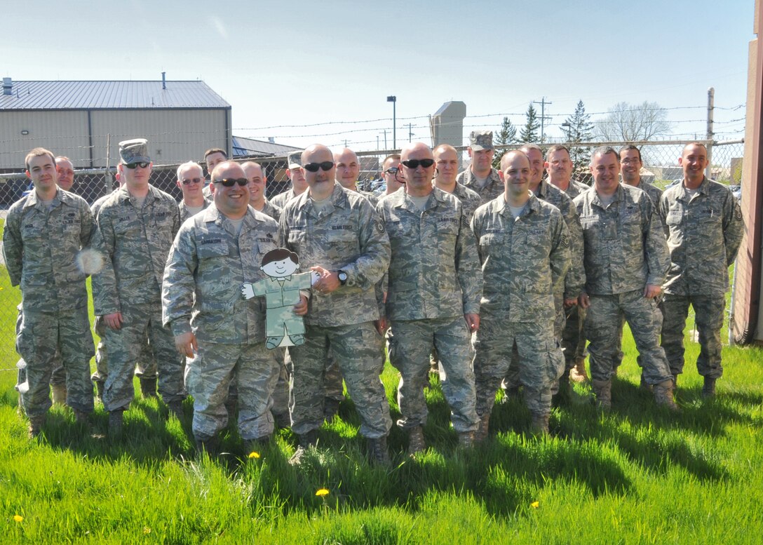 Members of the 30th Aerial Port Squadron say goodbye to friends and family as they prepare for deployment, May 09, 2011, Niagara Falls Air Reserve Station, NY. Airman from the 30th APS are slated to perform duties such as aircraft passenger processing, loading and unloading both military and civilian aircraft, load planning and building air drop platforms for airdropping food, water, ammunition and medical supplies which is a vital resource to Service members stationed in remote areas. (U.S. Air Force photo by Staff Sgt. Joseph McKee)