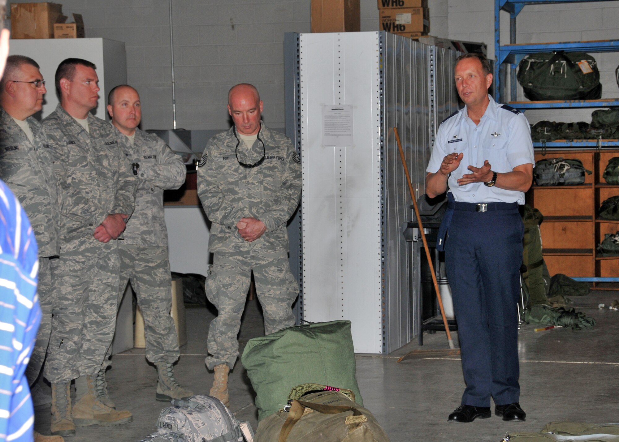 914th Airlift Wing Commander Col. Allan L. Swartzmiller gives words of encouragement to deploying members of the 30th Aerial Port Squadron, May 09, 2011, Niagara Falls Air Reserve Station, NY. Airman from the 30th APS are slated to perform duties such as aircraft passenger processing, loading and unloading both military and civilian aircraft, load planning and building air drop platforms for airdropping food, water, ammunition and medical supplies which is a vital resource to Service members stationed in remote areas. (U.S. Air Force photo by Staff Sgt. Joseph McKee)