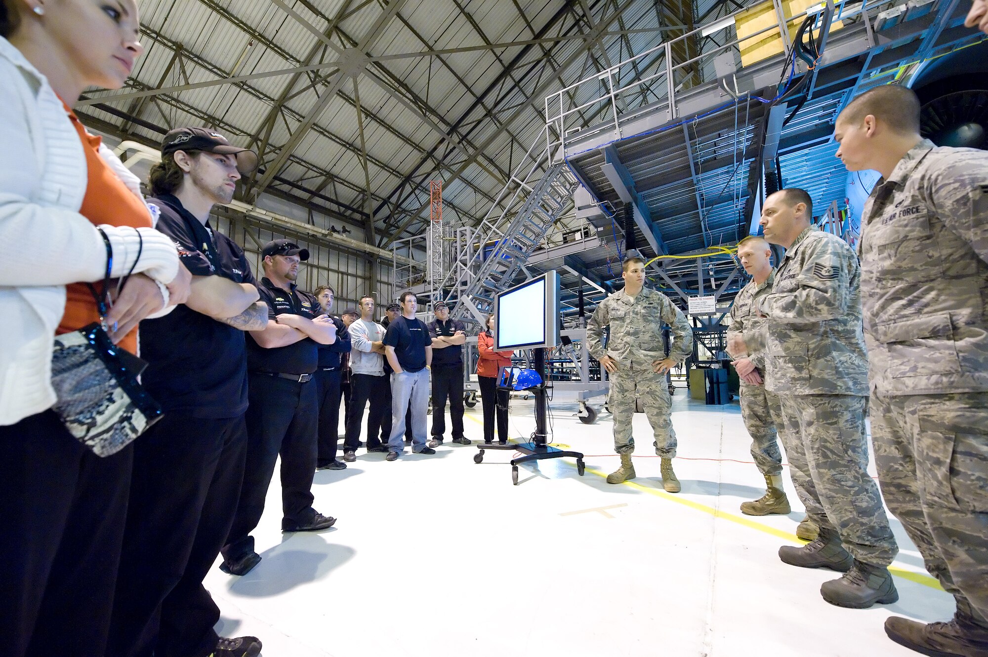 ThorSports Racing and Red Horse Racing team members tour the Isochronal Dock May 13, 2011, at Dover Air Force Base, Del. The teams toured a C-17 Globemaster III as well as a C-5 Galaxy on their trip here. (U.S. Air Force photo by Airman 1st Class Jacob Morgan)