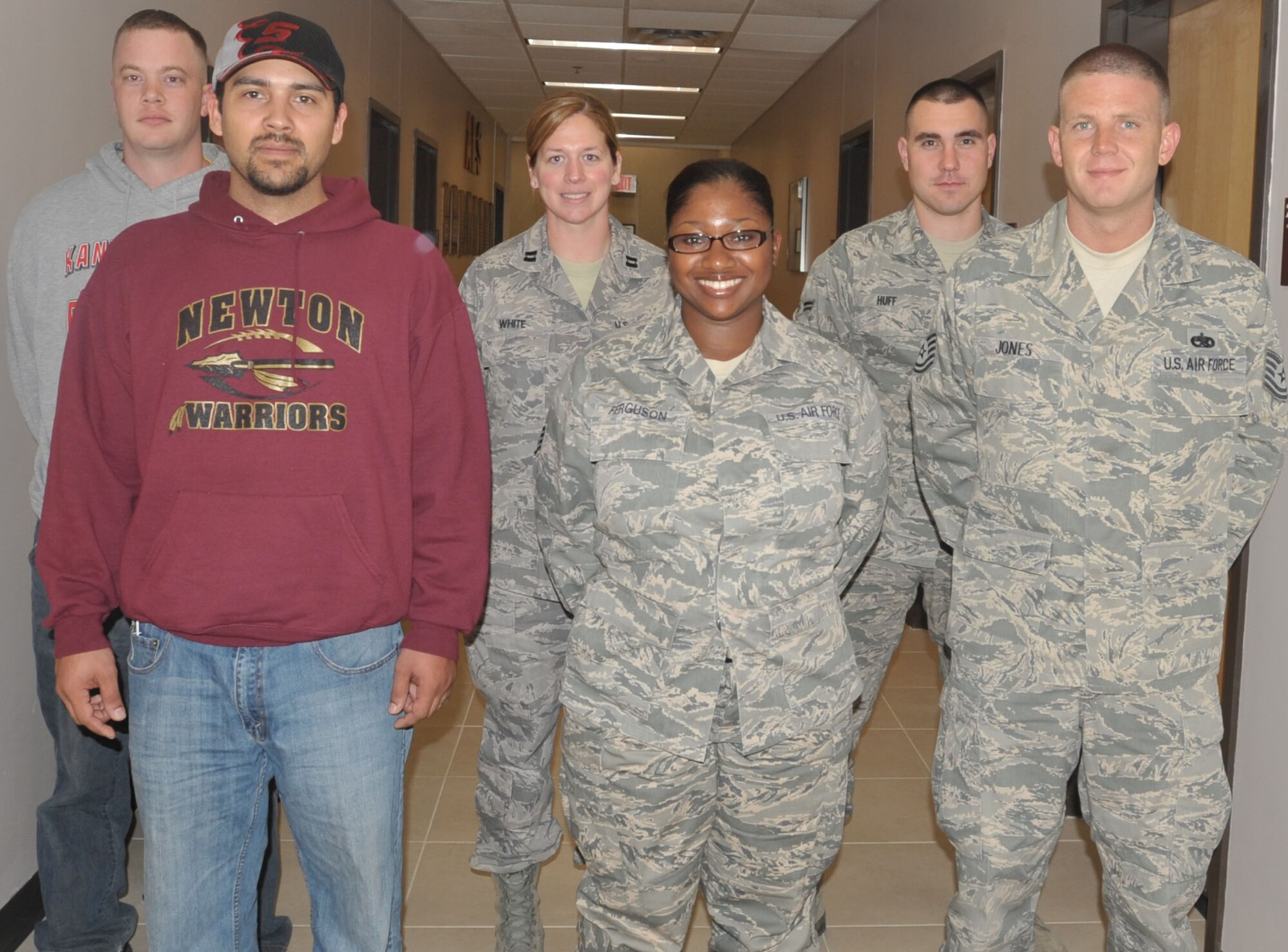 The 931st Air Refueling Group welcomed the following individuals into the organization during the unit training assembly, May 14-15. Pictured are: Front row, left to right: Senior Airman Weldon, Staff Sgt. Ferguson, Tech. Sgt. Jones.  Second row: Staff Sgt. Jones, Capt. White, Airman 1st Class Huff.  (Air Force photo by Staff Sgt. Carrie M. Peasinger)