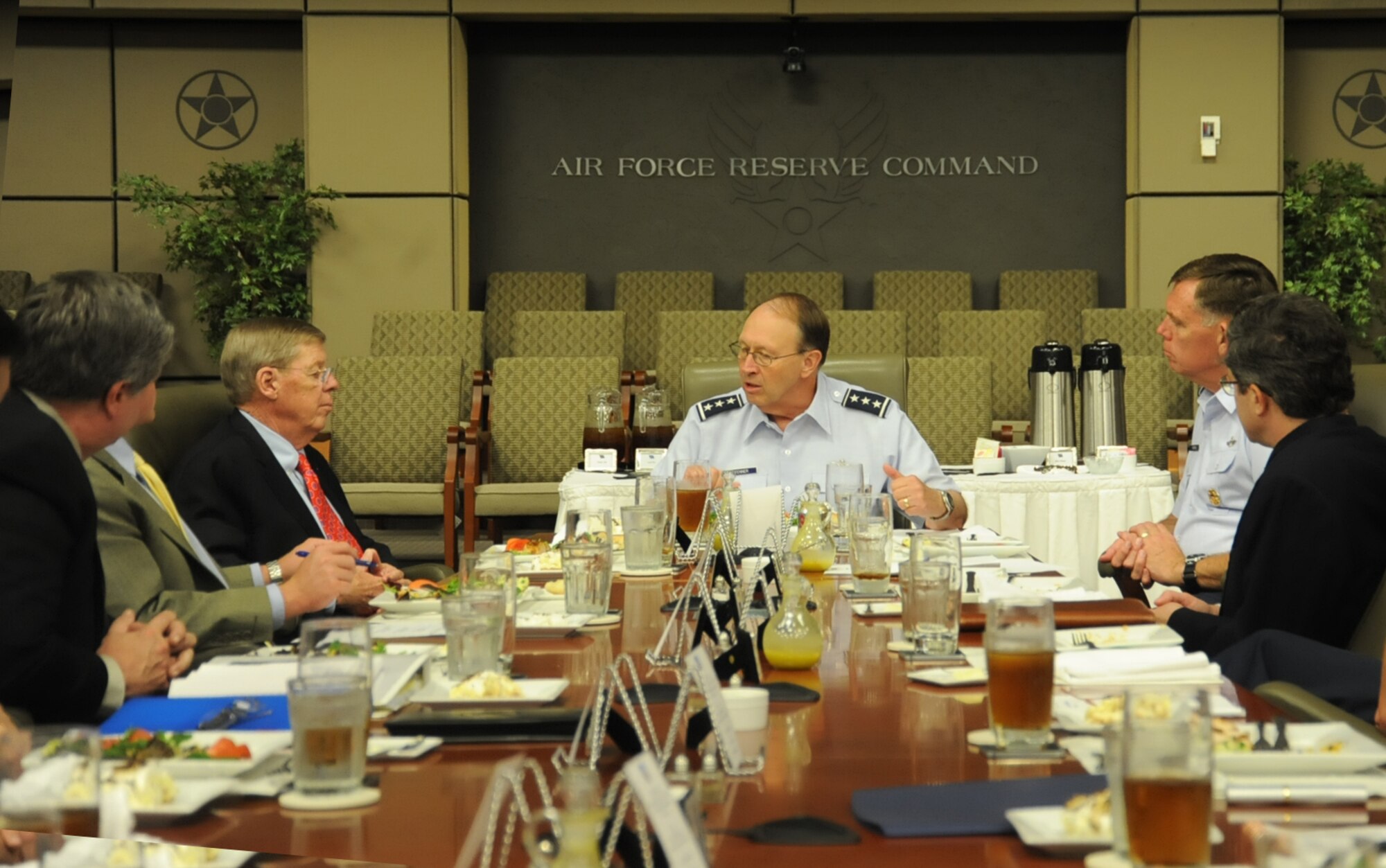 Lt. Gen. Charles E. Stenner Jr. talks with Sen. Johnny Isakson (R-GA), left, during the senator's visit to Headquarters AFRC May 14, 2011. The AFRC commander shared his vision of "Total Force 21," a recommendation to right-size the command to meet growing requirements and shrinking budgets. (U.S. Air Force photo/Raymond Crayton Jr.)