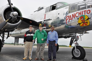 World War II Veterans Ben Wainwright, William Chambers and Walter Dandridge reunite with a restored North American B-25 bomber during the AirPower over Hampton Roads open house at Langley Air Force Base, Va., May 13, 2011. The Disabled American Veterans Flight Team provided the three gentlemen with honor flights in "Panchito" as part of DAV's veteran outreach program. (U.S. Air Force photo/Airman 1st Class Jason J. Brown)(RELEASED)