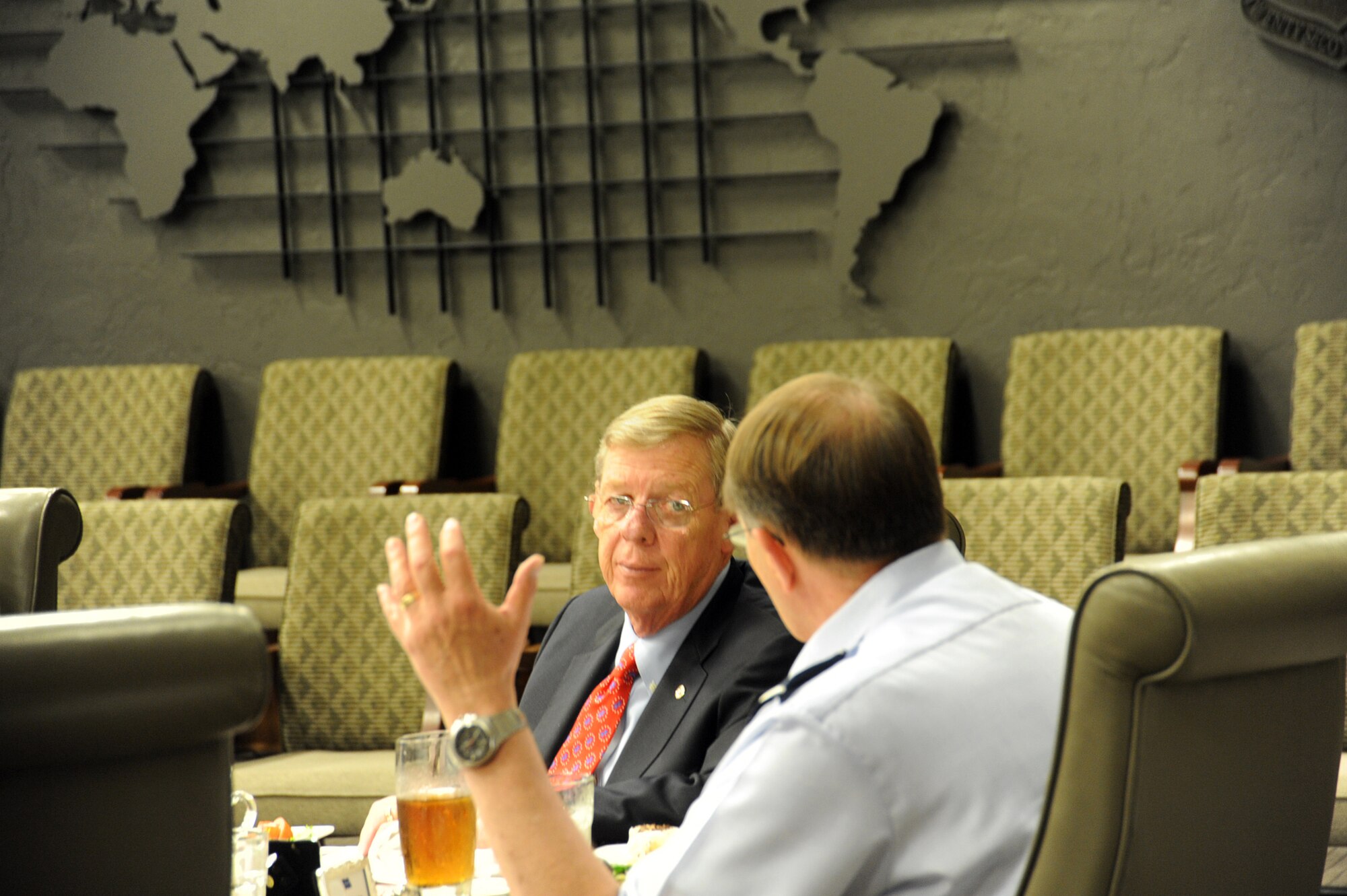 Lt. Gen. Charles E. Stenner Jr. talks with Sen. Johnny Isakson (R-GA) during the senator's visit to Headquarters AFRC May 14, 2011. The AFRC commander shared his vision of "Total Force 21," a recommendation to right-size the command to meet growing requirements and shrinking budgets. (U.S. Air Force photo/Raymond Crayton Jr.)