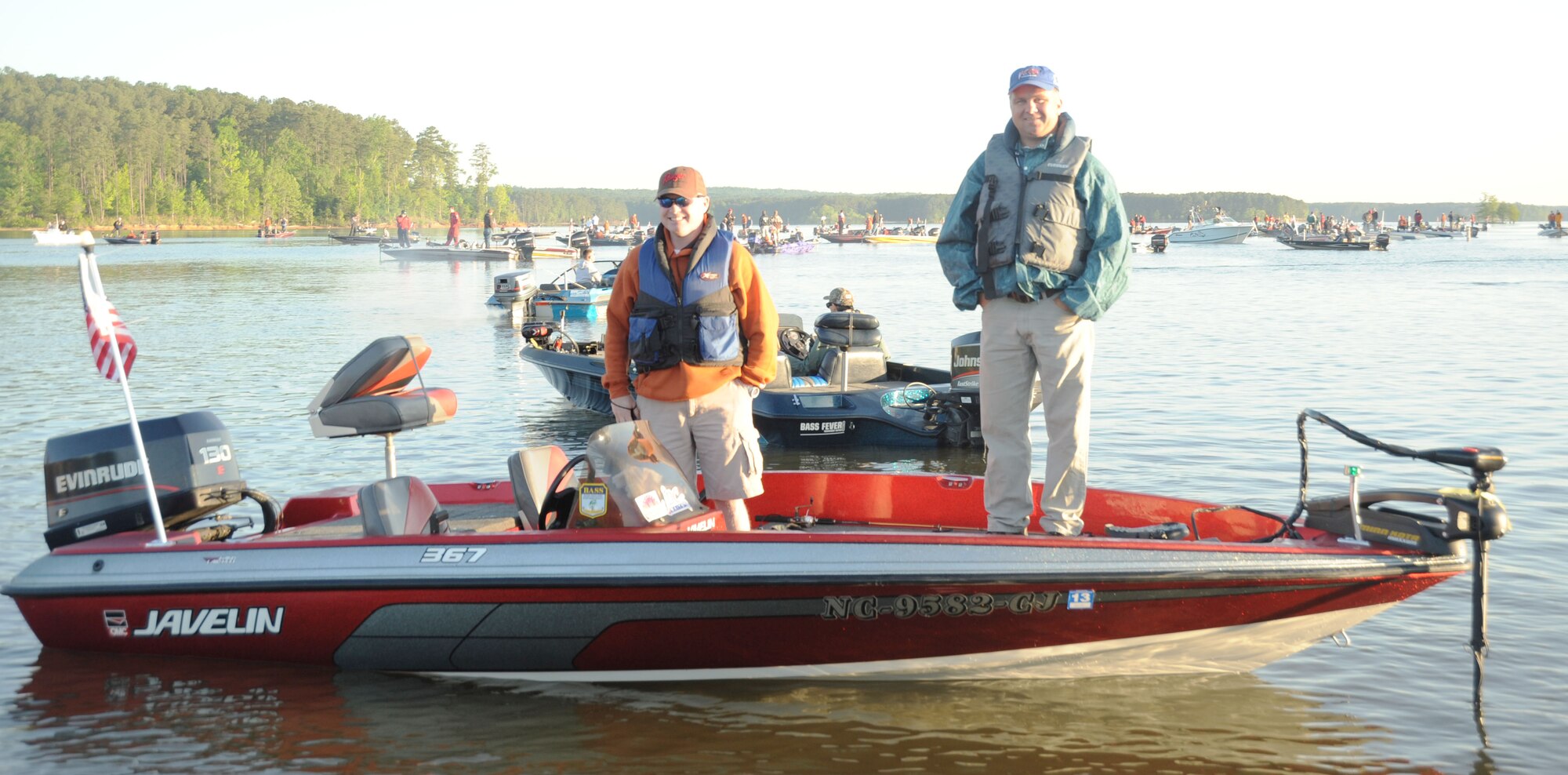 Kenny Hall,(right) boat owner, and Master Sgt. Tracy Cornett, guest angler prepare to "blast off" on the 6th Annual Warriors on the Water Fishing Tournament held at Jordan Lake, N.C. April 29, 2011. Hall and Sergeant Cornett were grade and high school classmates growing up in Granite Falls, N.C. and although they work for Lenior Police Department, they have never had the chance to fish together. Hall has been a volunteer boater for Warriors on the Water for three years, but the tournament was the first for Sergeant Cornett.  Sergeant Cornett is the First Sergeant for the 440th Logistics Squadron. (U.S. Air Force photo by Jerry Green)