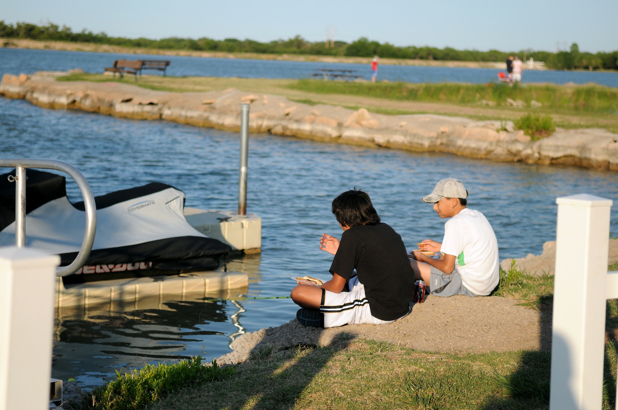 GOODFELLOW AIR FORCE BASE, Texas --Team Goodfellow members enjoy lunch at the lake, May 14. Goodfellow's Recreation Camp on Lake Nasworthy, is an extension of the services provided by the 17th Force Support Squadron's Outdoor Recreation Center. (U.S. Air Force photo/Staff Sgt. Heather Rodgers)
