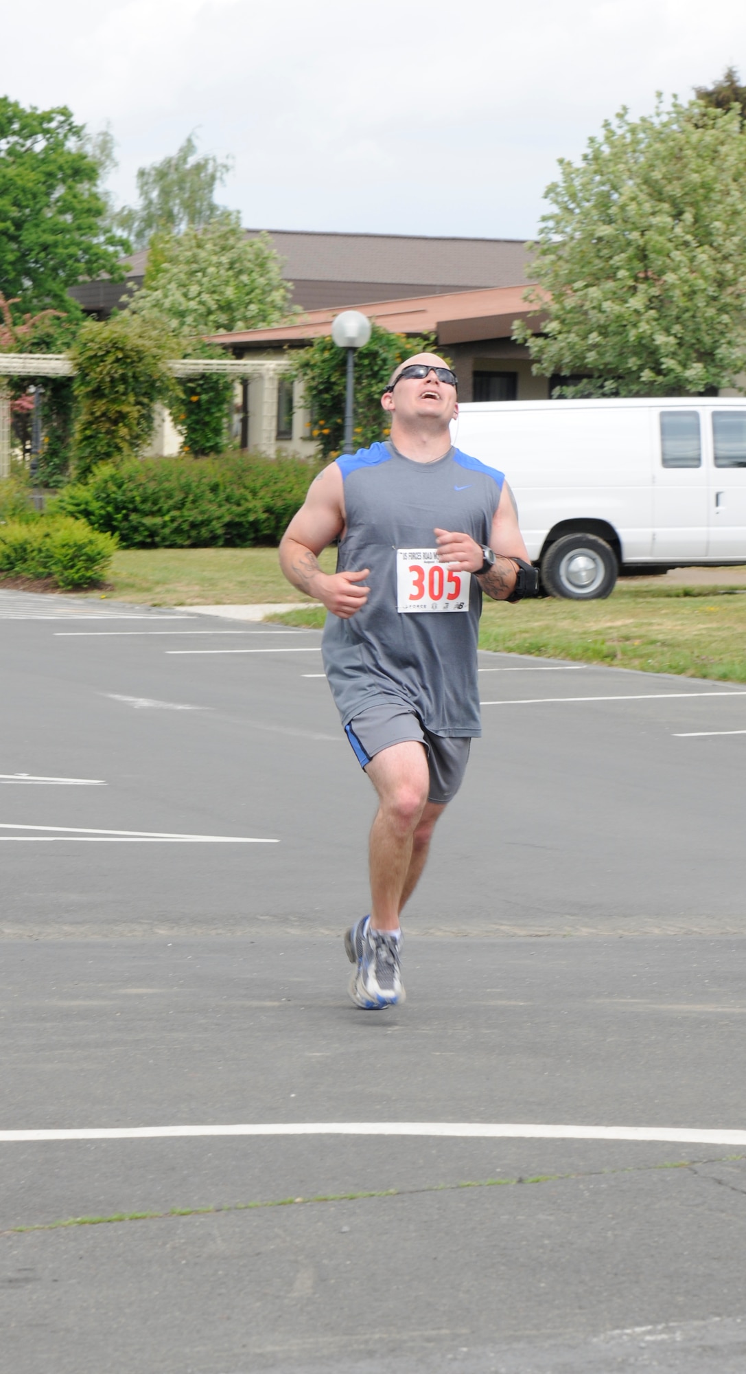 SPANGDAHLEM AIR BASE, Germany – Jonathan Geren, takes third in the U.S. Air Forces in Europe half marathon male category ages 30-39, finishes his run with a time of 1 hour 40 minutes and 2 seconds at the Skelton Memorial Fitness Center here May 14. The USAFE half marathon is an annual event Airmen from around Europe can participate in. Each run was split into different categories based on age and gender. (U.S. Air Force photo/Airman 1st Class Brittney Frees)