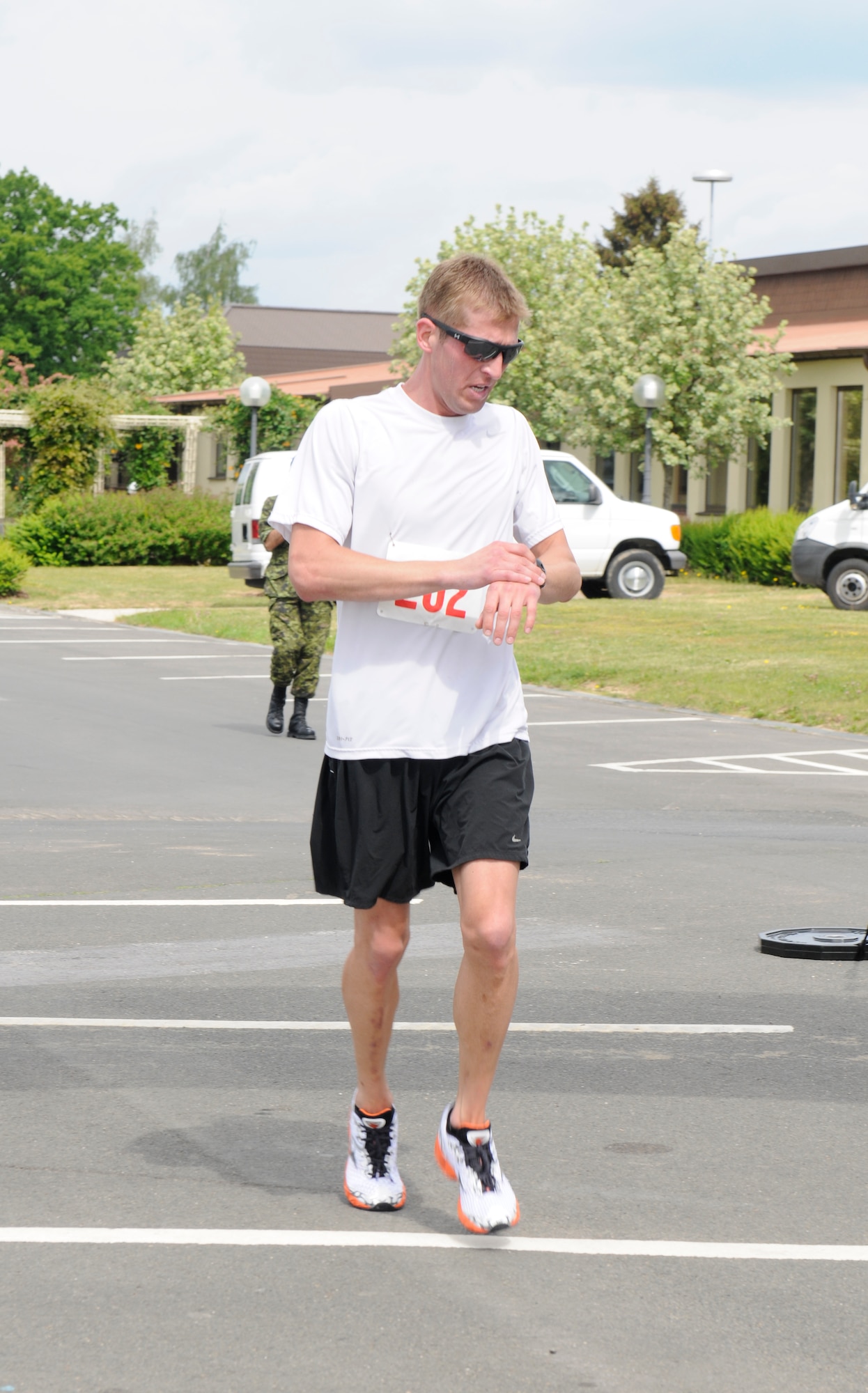 SPANGDAHLEM AIR BASE, Germany – Stephen Hjerstedt, takes second in the U.S. Air Forces in Europe half marathon male category ages 18-29, finishes his run with a time of 1 hour 31 minutes and 21 seconds at the Skelton Memorial Fitness Center here May 14. The USAFE half marathon is an annual event Airmen from around Europe can participate in. Each run was split into different categories based on age and gender. (U.S. Air Force photo/Airman 1st Class Brittney Frees)