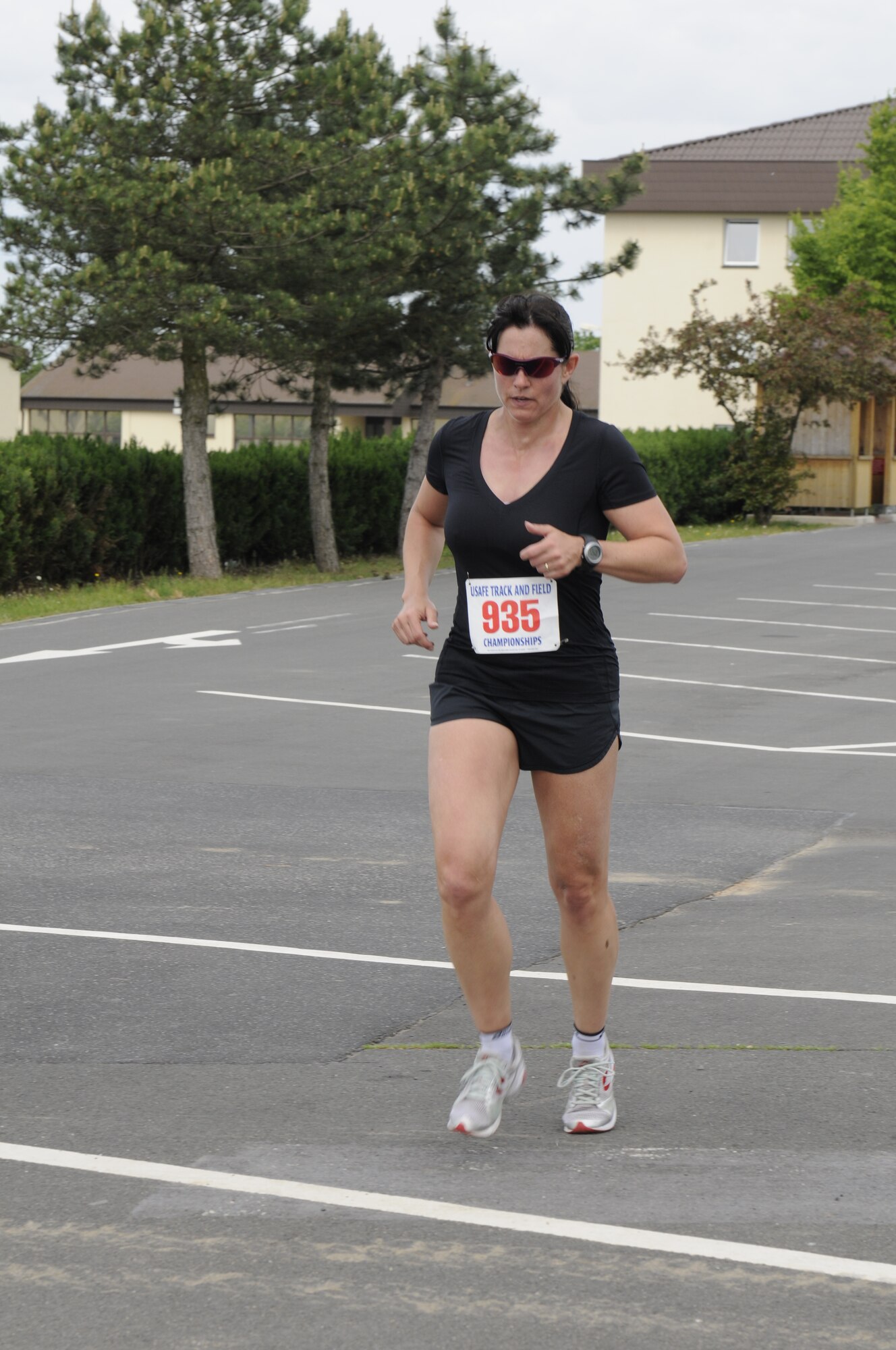 SPANGDAHLEM AIR BASE, Germany – Lyn Kingsley, wins the 10K female category, finishes her run with a time of 56 minutes and 54 seconds at the Skelton Memorial Fitness Center here May 14. The USAFE half marathon is an annual event Airmen from around Europe can participate in. Each run was split into different categories based on age and gender. (U.S. Air Force photo/Airman 1st Class Brittney Frees)