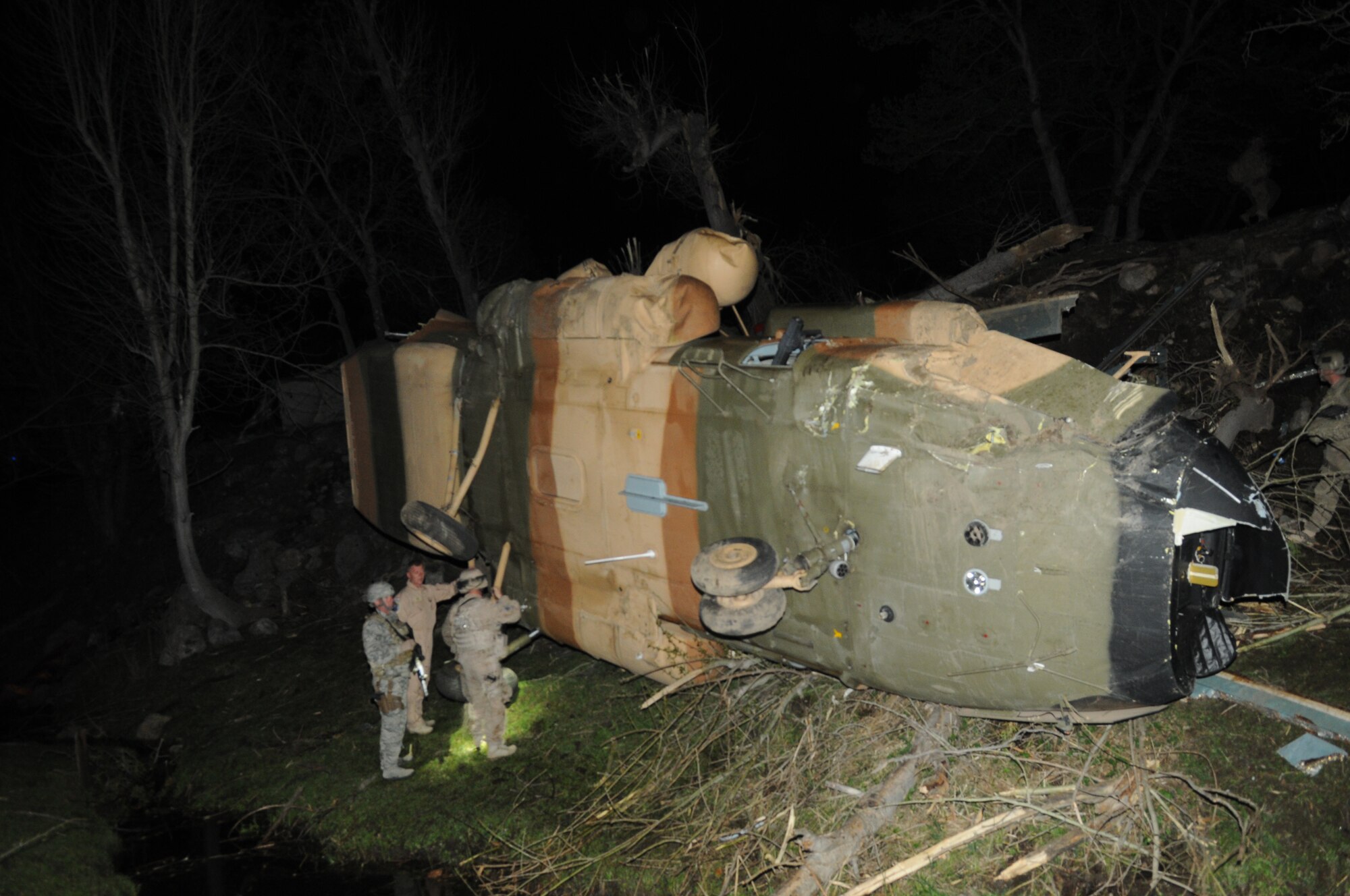 Nuristan,  Afghanistan. Army Pathfinders of Fox Company, 2nd Battalion, 10th Combat Aviation Brigade Fort Drum, NY arrive at the site of a Afghan Air Force Mi-17 helicopter crash in the Nuristan province, Afghanistan. The Pathfinders are tasked to provide security around the perimeter and disassemble the aircraft so it can be sling loaded by a CH-47 Chinook and taken to an airbase. Photo by Tech Sgt. Brian E. Christiansen