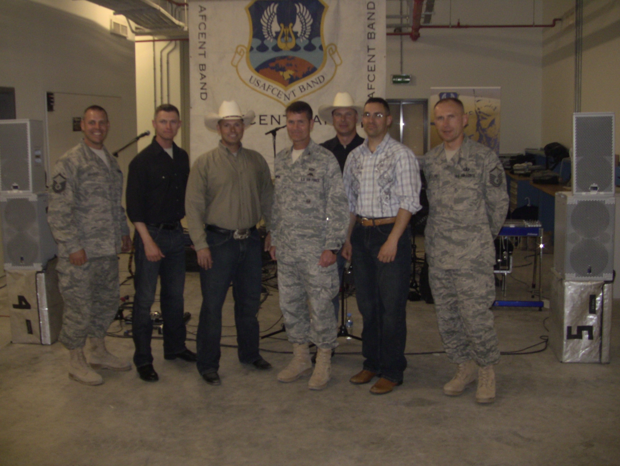 AFCENT Band Wild Blue Country with CFSOCC Commander Col. Thompson after festivities. (U.S. Air Force photo by Master Sgt. Karl Bradley)