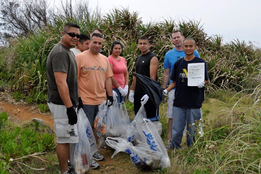 Kadena Air Base Airmen and local nationals from the 18th Logistical Readiness Squadron volunteer to clean up Cape Zanpa Beach Park. (U.S. Air Force/Courtesy Photo)