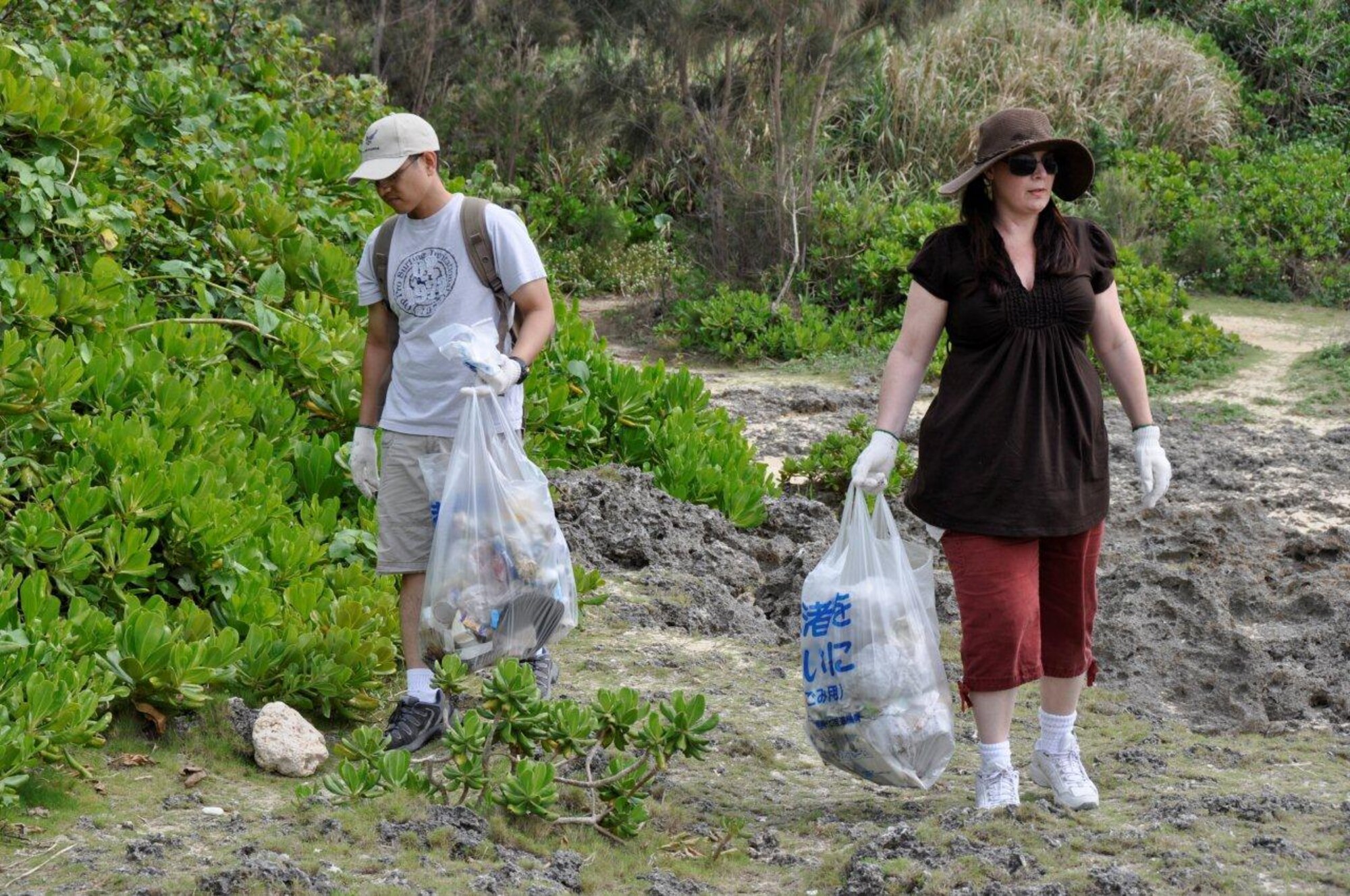 Kadena Air Base Airmen and local nationals from the 18th Logistical Readiness Squadron volunteer to clean up Cape Zanpa Beach Park. (U.S. Air Force/Courtesy Photo)
