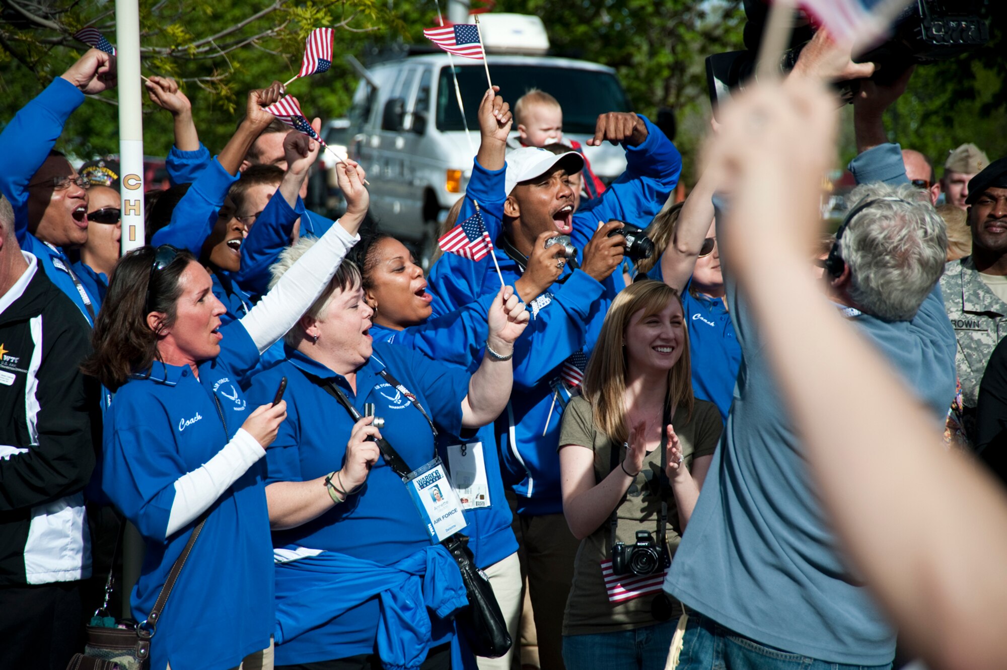 Supporters, friends and family members cheer on the Air Force team during the 2011 Warrior Games opening ceremony May 16, 2011, at the U.S. Olympic Training Center in Colorado Springs, Colo. (U.S. Air Force photo/Staff Sgt. J. Paul Croxon)