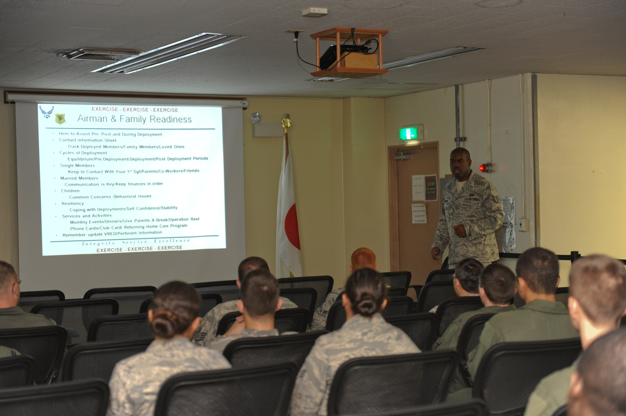 Tech. Sgt. Raynard Brooks, Airman and Family Readiness Center, briefs Airmen playing in the Kadena Air Base Local Operations Readiness Exercise about Operational Security May 16.  The Beverly High 11-04 LORE is an exercise involving the entire base to help ready Airmen for possible real-world situations. (U.S. Air Force photo/ Airman 1st Class Brooke Beers)