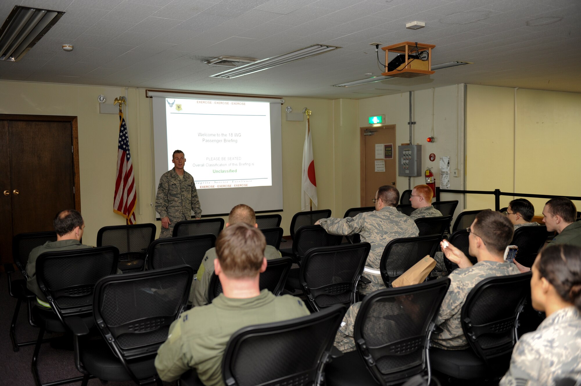 Staff Sgt. Nicholas Siplak, 18th Logistics Readiness Squadron, briefs Airmen playing in the Local Operations Readiness Exercise about Operational Security May 16.  The Beverly High 11-04 LORE is an exercise involving the entire base to help ready Airmen for possible real-world situations. (U.S. Air Force photo/ Airman 1st Class Brooke Beers)
