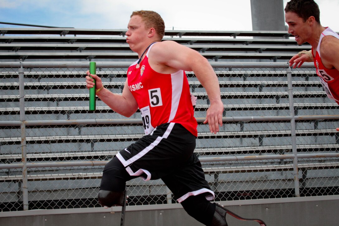 Lance Cpl. Joshua Wege sprints the last 100 meters in the 4x100-meter relay event at the 2011 Warrior Games May 17, 2011, in Colorado Springs, Colo. Wege ran anchor, or last, in the relay, and the All-Marine team took gold in the event.