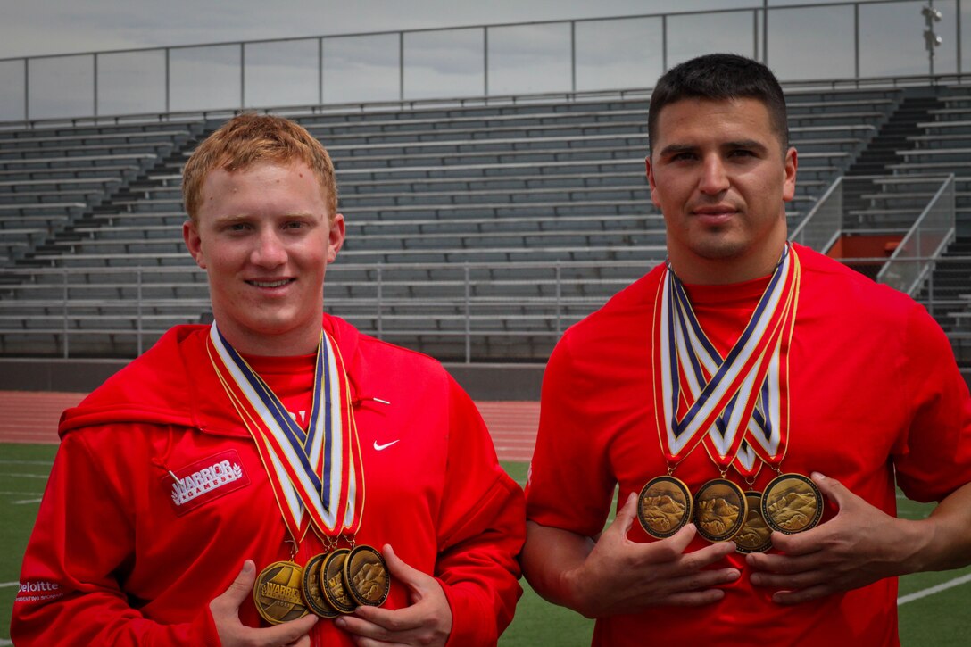 Lance Cpl. Joshua Wege and Marine veteran Sgt. Jose Gonzales took gold in all four events they competed in at the 2011 Warrior Games in Colorado Springs, Colo., May 17, 2011. Gonzales took first in the 800-meter dash, open classification, 100-meter dash, open classification, 200-meter dash, open classification, and the 4x100-meter relay. Wege placed first in the 800-meter dash, lower body classification, 200-meter dash, lower body classification, 100-meter dash, lower body classification, and 4x100-meter relay.