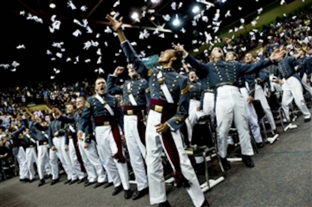 Cadets celebrate their graduation after Virginia Military Institute's commencement ceremony in Lexington, Va., on May 16, 2011.  