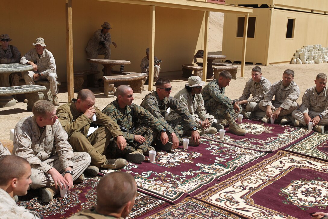 Marines participated in a shura at range 220 and practiced talking through interpreters in a training exercise as part of Operation Urban Thunder May 18, 2011.
