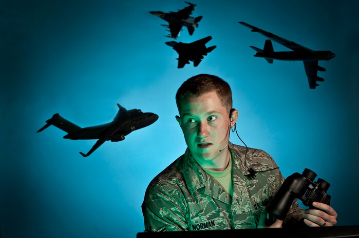 NELLIS AIR FORCE BASE, Nev. -- Airman 1st Class Seth Norman, an Air Traffic Controller Apprentice from the 57th Operation Support Squadron has been assigned to Nellis for 8 months and feels lucky to have been station here because of the high operations tempo. The Nellis air traffic control tower is consistently one of the busiest towers in the Department of Defense. "If you can make it in ATC here you can do it anywhere," said Airman Norman. "Because we are Nellis we see every aircraft in the Air Force inventory." (U.S. Air Force illustrative photo by Tech. Sgt. Michael R. Holzworth)