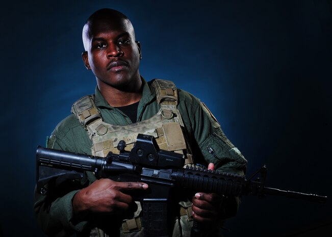 NELLIS AIR FORCE BASE, Nev. --Tech. Sgt. Mark Moore, a flight engineer from the 66th Rescue Squadron, has the important task of performing preflight, through-flight and post flight inspections on rotary aircraft. He also has additional responsibilities as an aerial gunner.  Tech Sgt. Moore retrained into the flight engineer career field 3-years-ago seeking a more challenging job. While deployed to Afghanistan, his crew was credited with over 30 lives saved and over 75 assists during combat operations. (U.S. Air Force illustrative photo by Staff Sgt. William P. Coleman)  