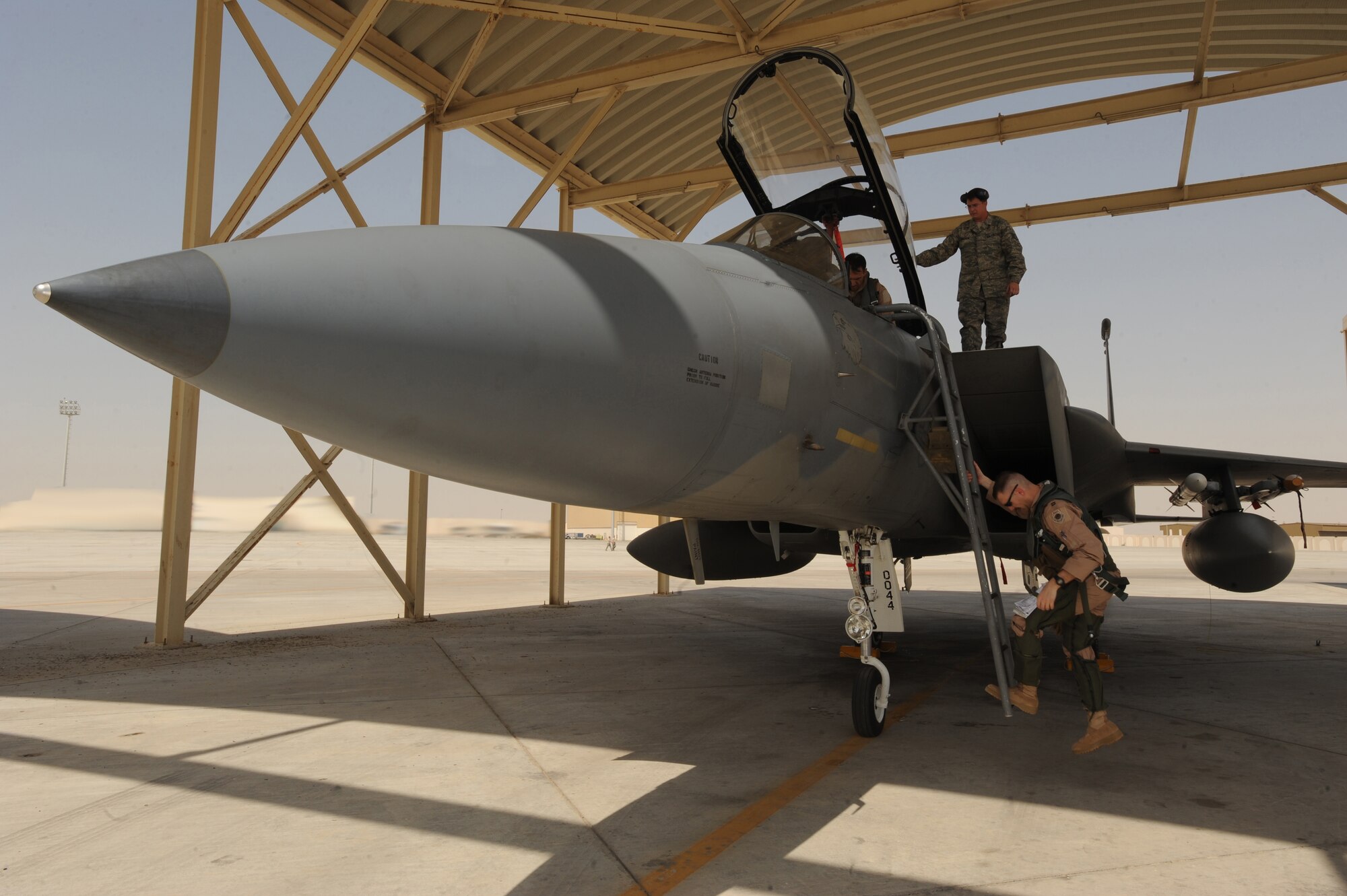 Capt. John Delion, a 493rd Expeditionary Fighter Squadron pilot, steps down after completes his 1,000th-hour milestone in the F-15C Eagle April 27, 2011, in Southwest Asia. Captain Delion completed this milestone participating in a regional training exercise. The 493rd EFS is deployed from Lakenheath AB, U.K. (U.S. Air Force photo by Senior Airman Maynelinne De La Cruz)