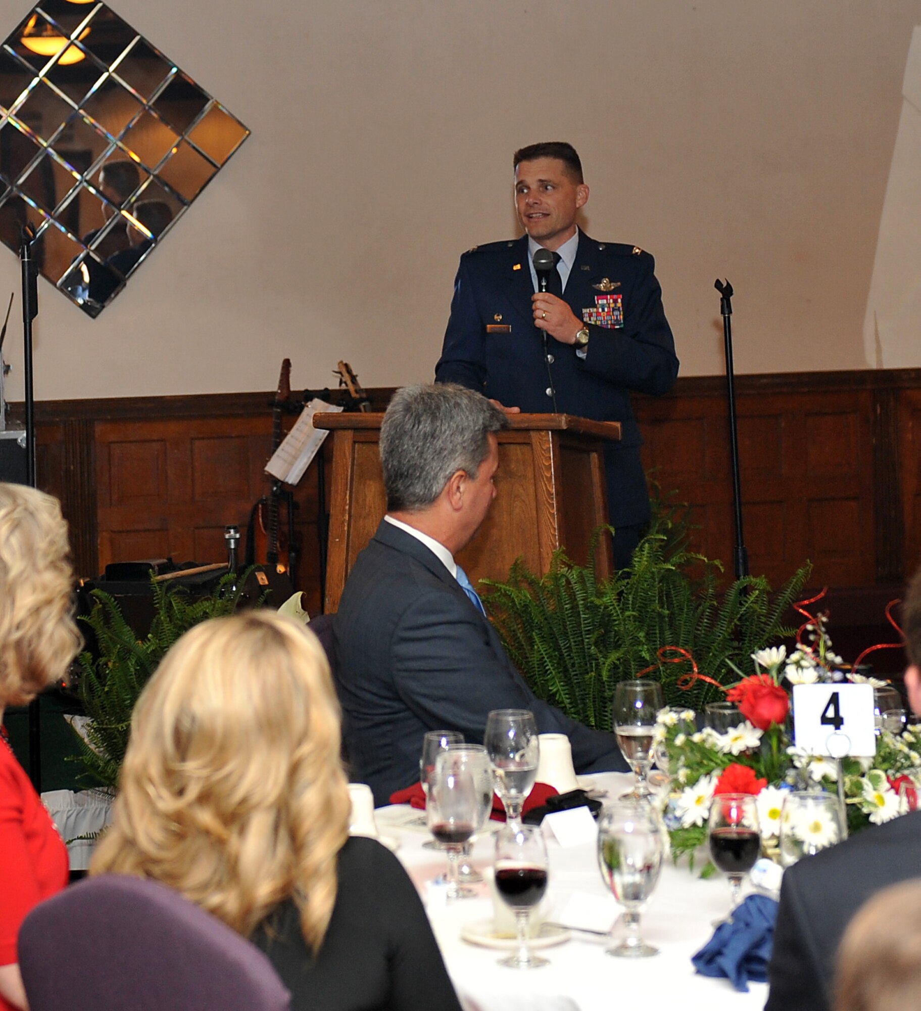 Col. Michael Hornitschek, 375th Air Mobility Command commander, speaks at the Belle-Scott Dinner at Fischer's Restaurant in Belleville, Ill May 12, 2011.  The Belle- Scott Dinner was held in honor of the men and women of Scott Air Force Base for their service to the nation. (U.S. Air Force photo/ Airman 1st Class Divine Cox)

