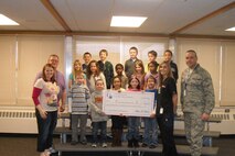 MINOT AIR FORCE BASE, N.D. -- Air Force Global Strike Command’s North Plains Elementary school sponsored its second annual Penny War, a one-week event aimed at raising money to go towards the fight against cancer, here April 11 - 15. The 2011 Penny War victory went to Marybeth Popham’s second grade class, pictured here. (Courtesy photo)