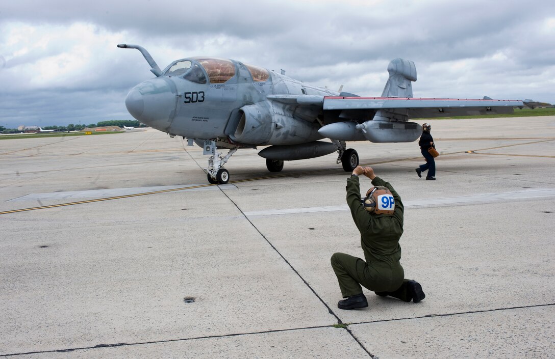 Navy aviation mechanic 3rd Class Rudina Calcano, Tactical Electronics Warfare Squadron 209, prepares to launch a squadron EA-6B Prowler after preflight operations for a local mission here May 17. The Naval Reserve is commemorating 
100 years of progress and achievement in naval aviation. The first successful hydro-aeroplane flight took place at Naval Air Station North Island, Ca., birth place of naval aviation, just eight years after the famed 1903 Wright brother's flight. (Photo by Bobby Jones)
