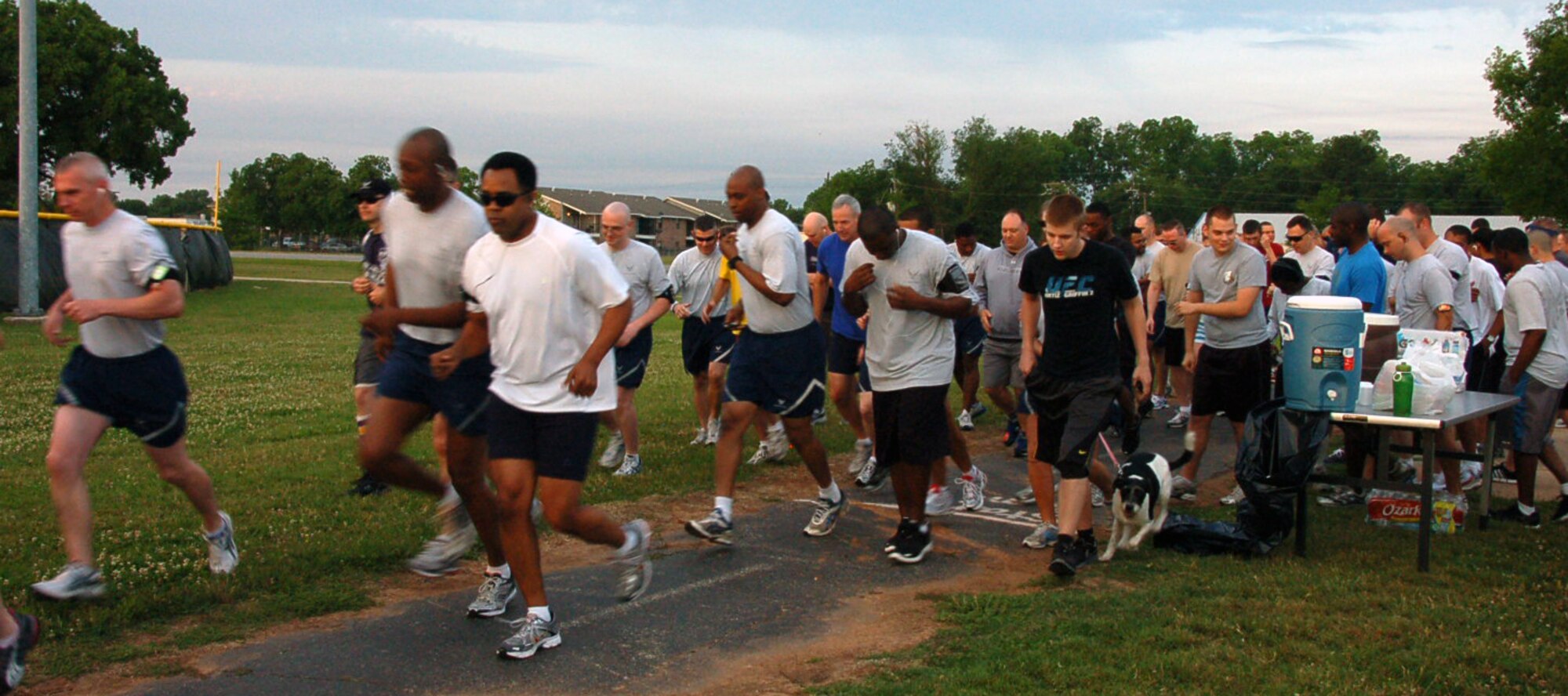 BARKSDALE AIR FORCE BASE, La. – Members of the Eighth Air Force headquarters staff take off from the starting line of the Eighth Air Force 5K Fun Run on Barksdale Air Force Base, La., May 18. The Mighty Eighth held the run in conjunction with the upcoming Eighth Air Force change of command. (U.S. Air Force photo by Staff Sgt. Brian Stives)