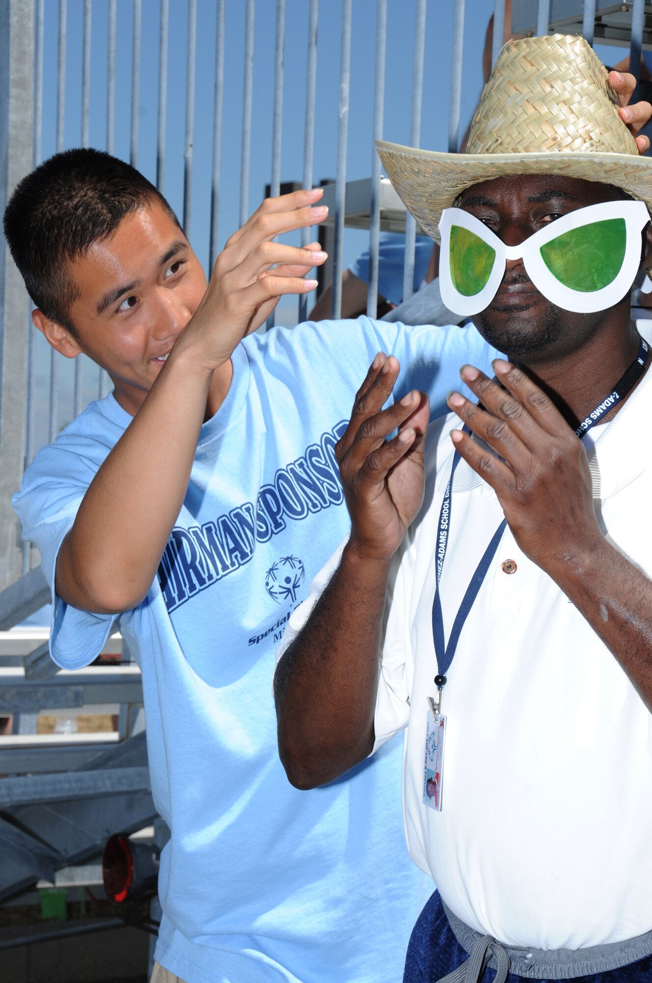 Airman 1st Class Richard Tsang, a student in the 338th Training Squadron, clowns around with athlete Michael Champ during Special Olympics, hosted by Keesler Friday and Saturday.  (U.S. Air Force photo by Kemberly Groue)