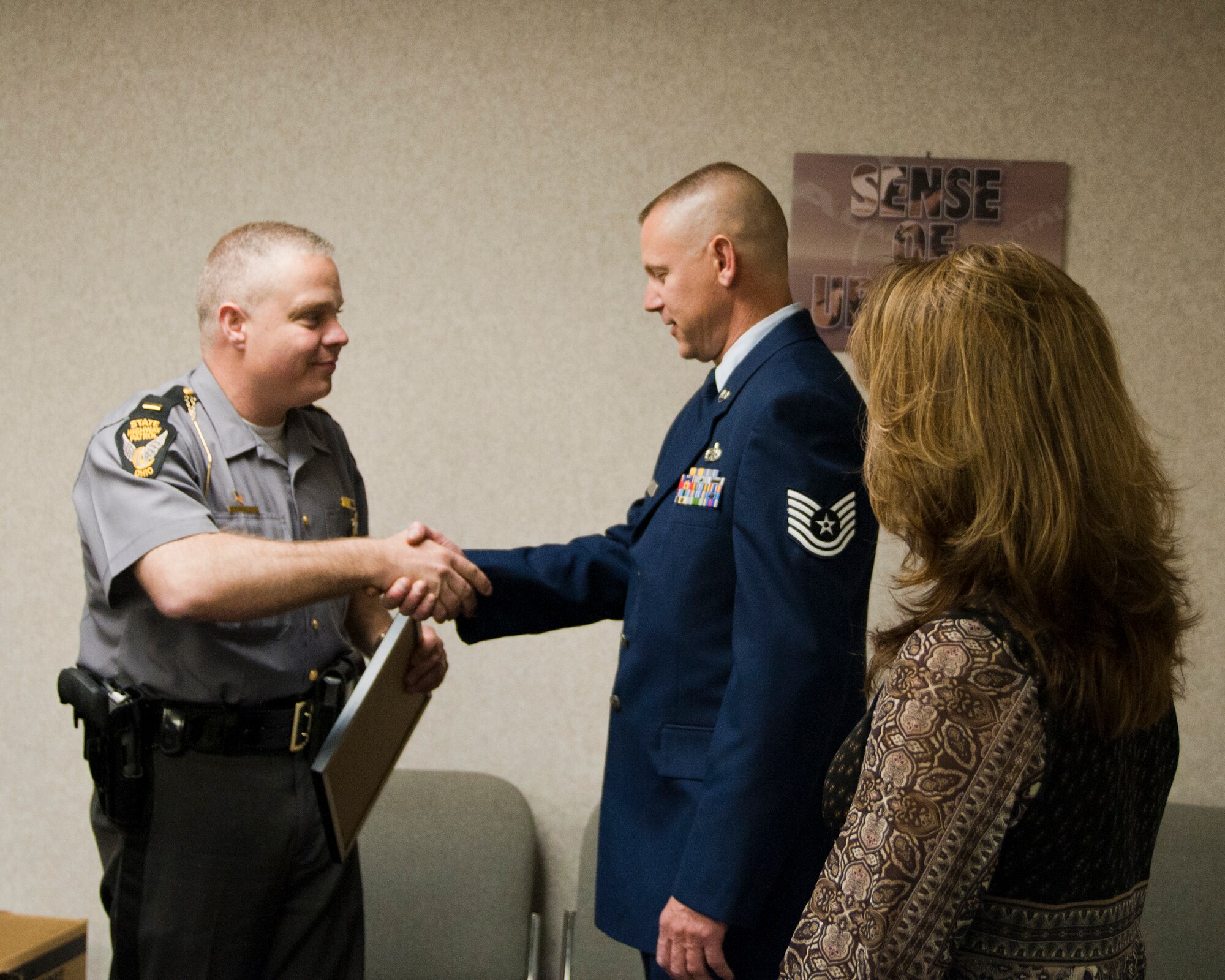 Technical Sgt. Tom Kocis, an aerial spray maintainer with the 910th Airlift Wing, recieved the Ohio State Highway Patrol Certificate of Recognition, Tuesday, May 17. On February 28, 2011, Sgt. Kocis waded through frigid chest-high water to rescue a 71-year-old woman from her vehicle. The woman lost control of her vehicle on a flooded highway and drove into a ditch. Ohio State Highway Patrol Lieutenant Brian Holt, Warren Post Commander, presented the away on behalf of Colonel John Born, Superintendent of the Ohio State Highway Patrol.