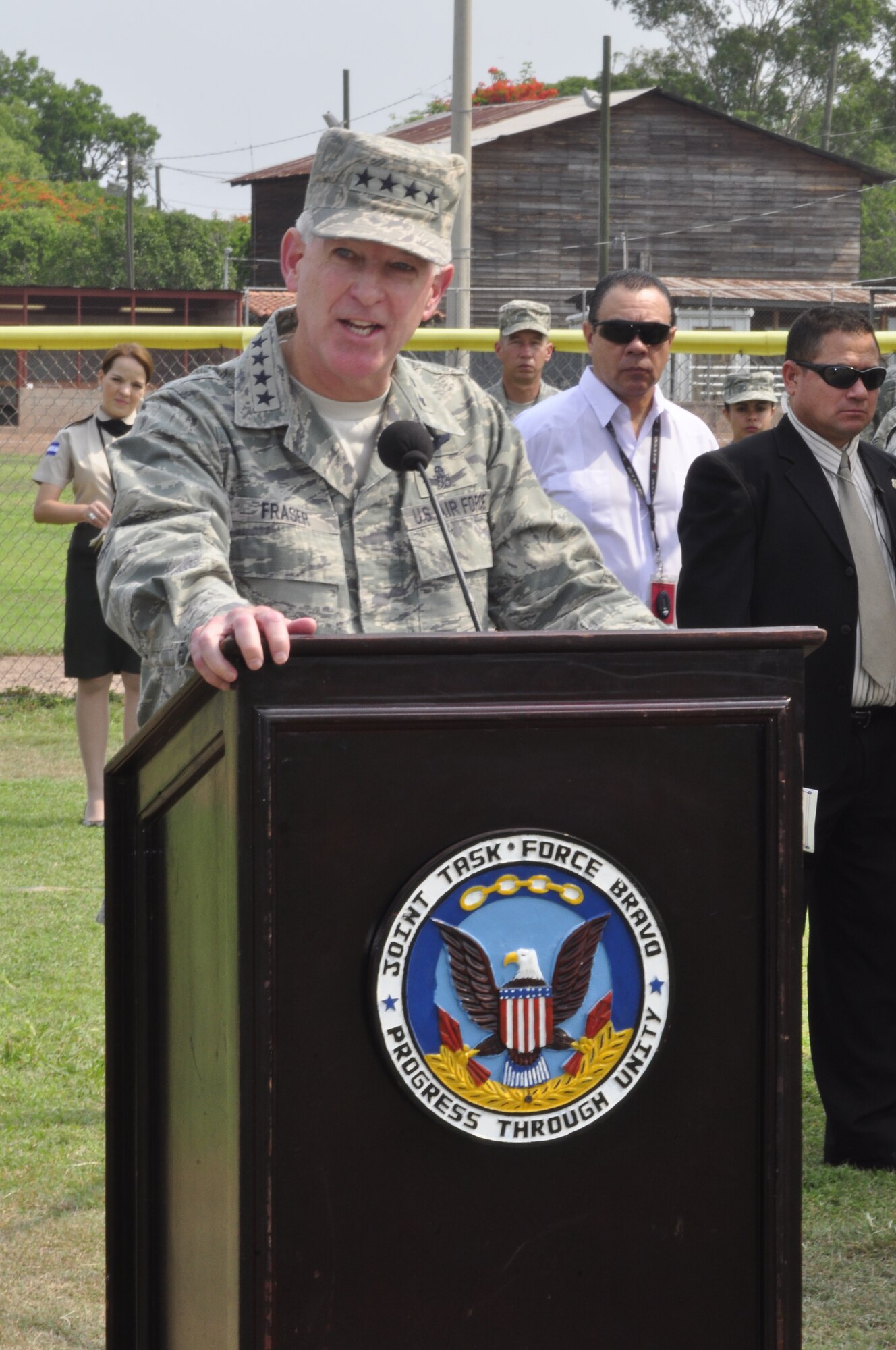 SOTO CANO AIR BASE, Honduras - Gen. Douglas M. Fraser, U.S. Southern Command commander thanks Col. Gregory D. Reilly, former Joint Task Force-Bravo commander, for his service and welcomes Col. Ross A. Brown, JTF-B commander, during a change of command ceremony here, May 18. (Department of Defense photo/Martin Chahin)