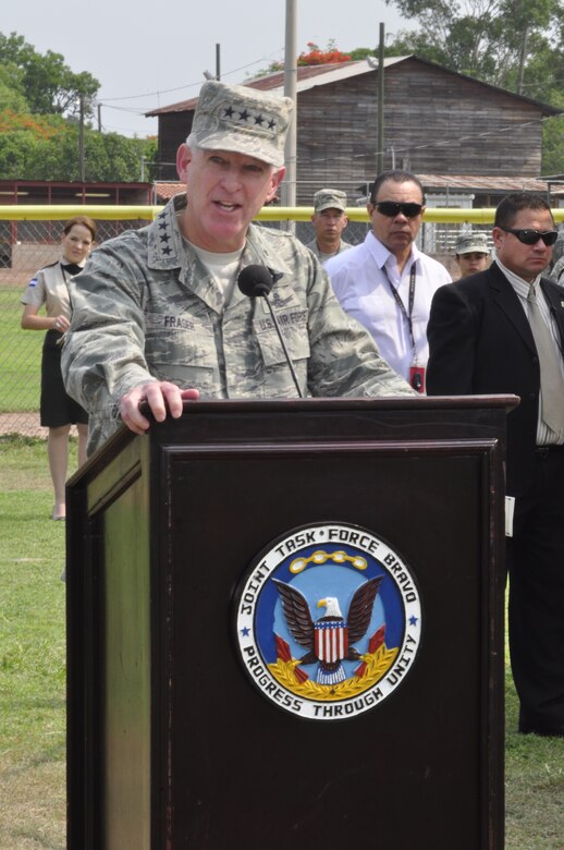 SOTO CANO AIR BASE, Honduras - Gen. Douglas M. Fraser, U.S. Southern Command commander thanks Col. Gregory D. Reilly, former Joint Task Force-Bravo commander, for his service and welcomes Col. Ross A. Brown, JTF-B commander, during a change of command ceremony here, May 18. (Department of Defense photo/Martin Chahin)