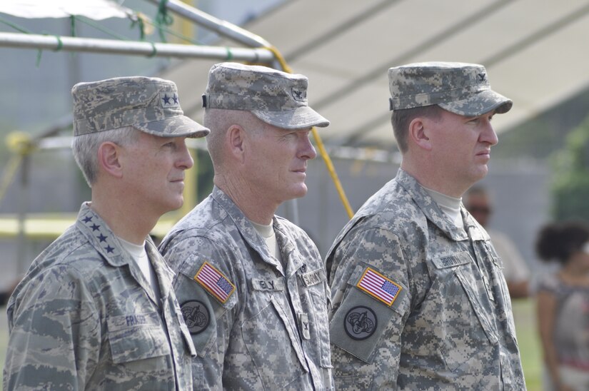 SOTO CANO AIR BASE, Honduras - General Douglas M. Fraser, U.S. Southern Command commander, Col. Gregory D. Reilly, outgoing Joint Task Force-Bravo commander and Col. Ross A. Brown, incoming JTF-Bravo commander, prepare to exicute a change of command ceremony here, May 18. (Department of Defense photo/Martin Chahin)