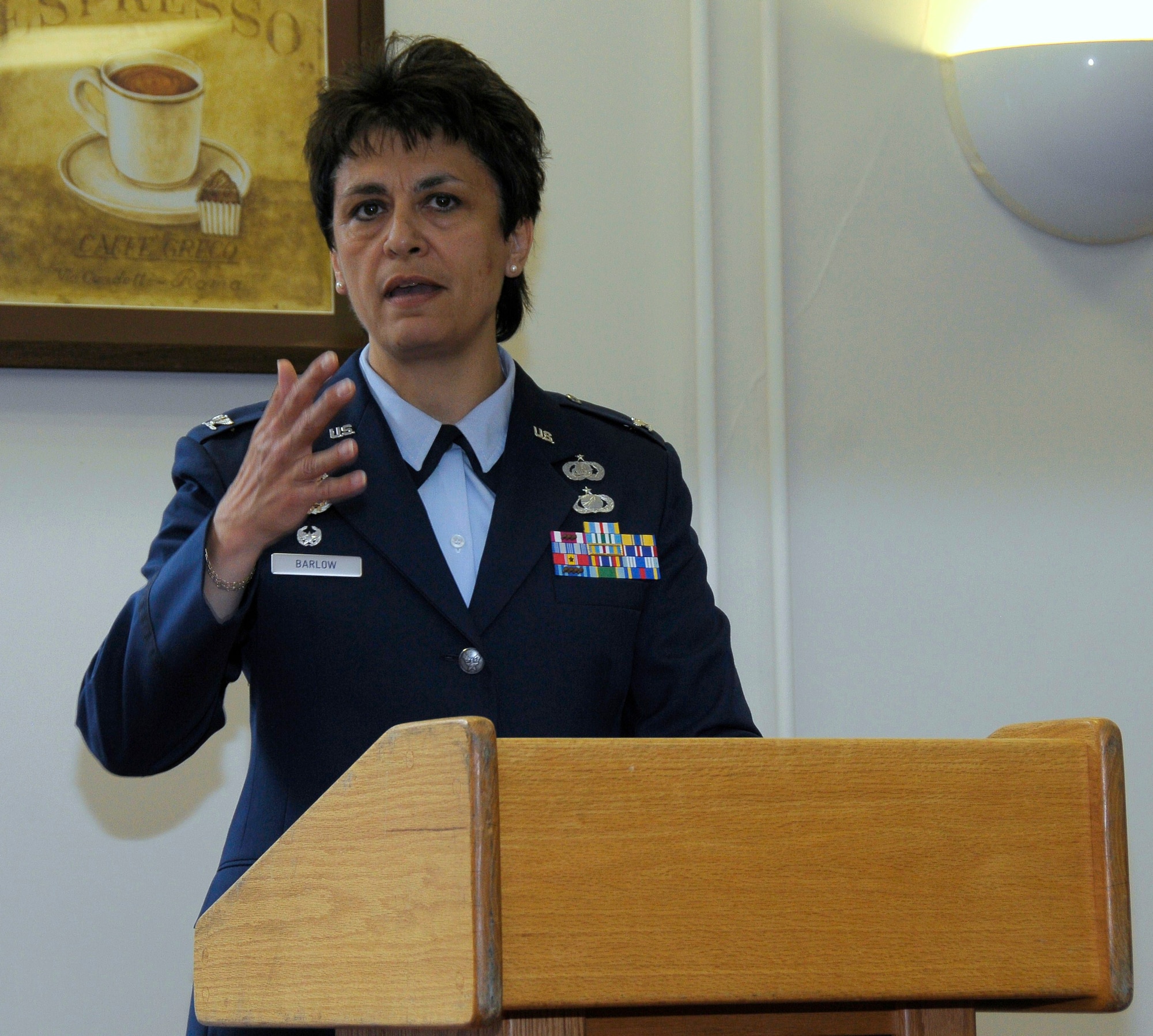 ROYAL AIR FORCE FELTWELL, England -- Guest speaker Col. Cassie Barlow, 48th Mission Support Group commander, speaks during the dedication ceremony of the newly renamed Ward Community Activity Center on May 14, 2011. The building was named in honor of Sgt. James A. Ward, the first New Zealander awarded the Victoria Cross; the British equivalent of the Medal of Honor. Sergeant Ward was stationed at RAF Feltwell with the Royal New Zealand Air Force No. 75 Squadron during World War II. He was awarded the medal for his heroic actions on July 7, 1941, when his Wellington bomber caught fire from an enemy attack. (U.S. Air Force photo/Staff Sgt. Connor Estes)