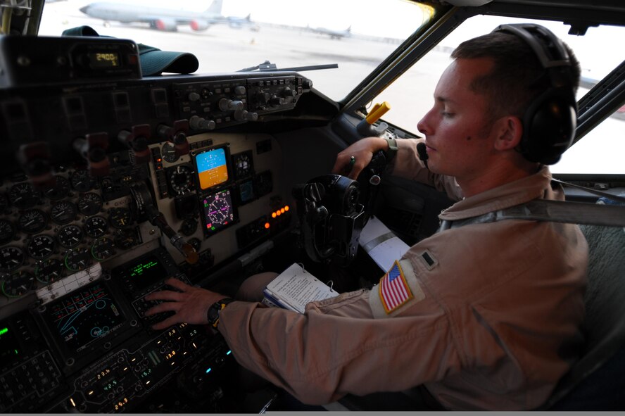 First Lt. Ronald Barnhart, a pilot with the 340th Expeditionary Air Refueling Squadron at a non-disclosed base in Southwest Asia, conducts preflight checks aboard a KC-135 Stratotanker aircraft bound for a refueling mission over Afghanistan May 8, 2011, in support of Operation Enduring Freedom. (U.S. Air Force Photo/Master Sgt. William Greer)