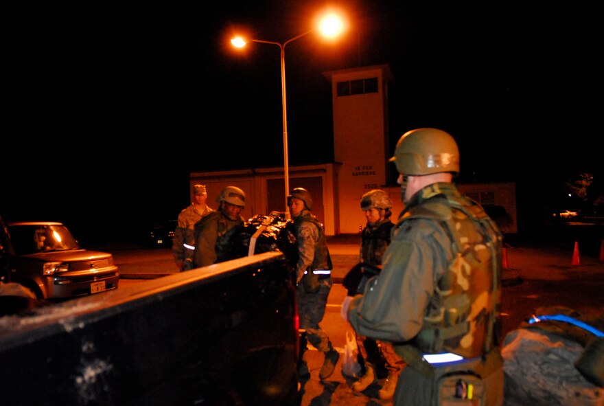 Airmen from the 961st Airborne Air Control Squadron participate in a Local Operations Readiness Exercise May 18 at Kadena Air Base, Japan. The Airmen loaded sensitive equipment onto a truck headed for their alternate operational location after a simulated power outage rendered their main building inoperative. The equipment was needed to re-establish a control center and continue operations. (Air Force photo/ Airman 1st Class Lottie J. Lowrey)

