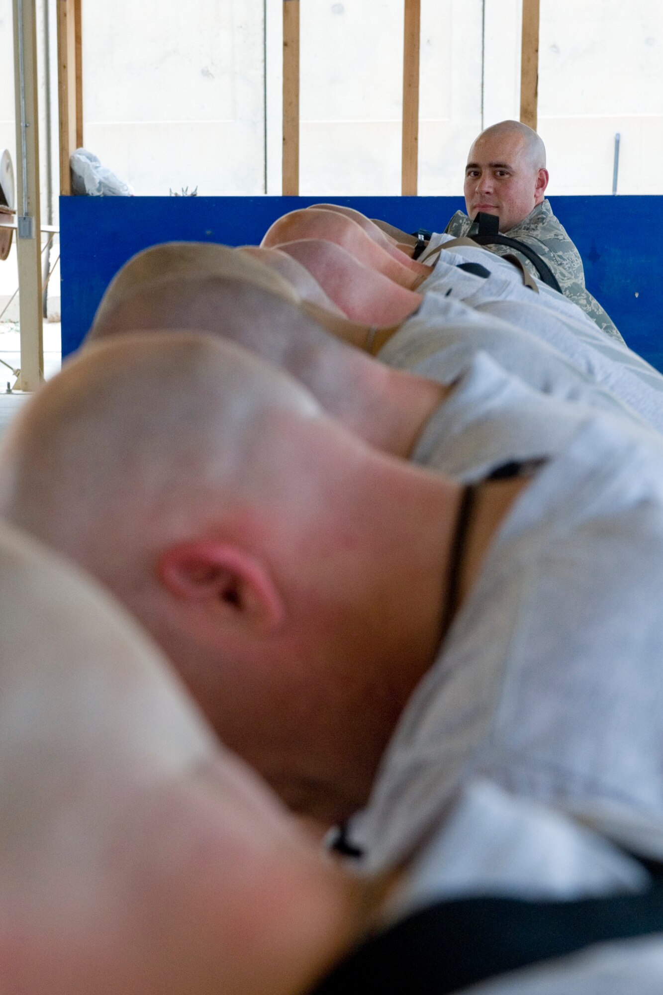 SATHER AIR BASE, Iraq – Lt. Col. Mark O'Reilly, Iraq Training and Advisory Mission-Air director of maintenance, and other Air Force members shaved their heads May 6 to show support for Colonel O'Reilly's father who is undergoing cancer treatment. Mr. O'Reilly, a former Marine and Bronze Star with Valor recipient, is his son’s role model and the reason he joined the Air Force. Colonel O'Reilly is deployed from Kadena Air Base, Japan, and is a native of Rockland, Mass. (U.S. Air Force photo by Staff Sgt. Levi Riendeau)