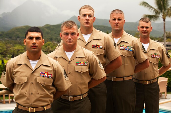 Five Marines from 3rd Battalion, 3rd Marine Regiment, were recognized by the local community for their recent achievements during the Kailua Chamber of Commerce’s general membership meeting at the Mid Pacific Country Club in Kailua, Hawaii, May 18, 2011. The Marines were honored as part of the statewide military appreciation month. Honorees from left to right include Sgt. Jorge Diaz, a squad leader with Kilo Company, 3/3, from Baltimore; Sgt. Kenney Clark, a squad leader with India Company, 3/3, from Rushville, Ill.; Cpl. Raymond P. Weeks, an intelligence specialist with Headquarters and Service Company, 3/3, from Miami; Staff Sgt. Justin Johnson, a motor transport mechanic with 3/3, from East Liverpool, Ohio; and Gunnery Sgt. Alan King, intelligence chief, 3/3, from Newport, Wash.