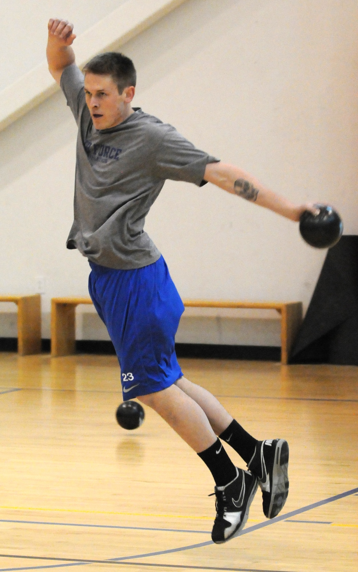 2nd Lt. James Curran, 319th Missile Squadron, shows his form successfully evading a ball during the dodge ball tournament part of the fitness day held at Freedom Hall Fitness Center May 11. (U.S. Air Force photo by R.J. Oriez)