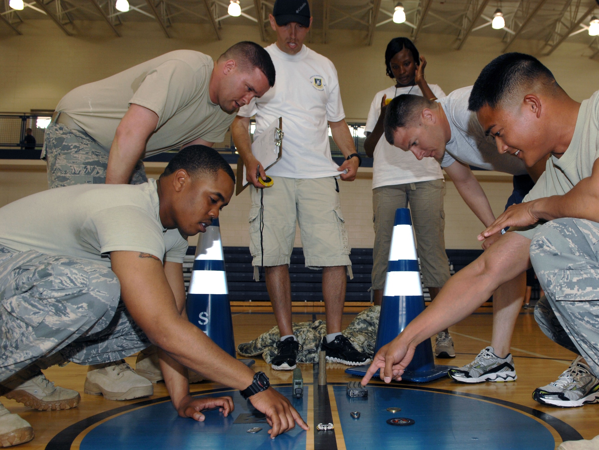 633d Security Forces Squadron Airmen, compete in the keep in memory challenge during the 633d Security Forces Squadron Strong Team Competition at Langley Air Force Base, Va., May 18, 2011. The competition was held as part of National Police Week ,an annual event held to remember fallen defenders, both military and civilian. (U.S. Air Force photo by Staff Sgt. Jeff Nevison)(RELEASED)