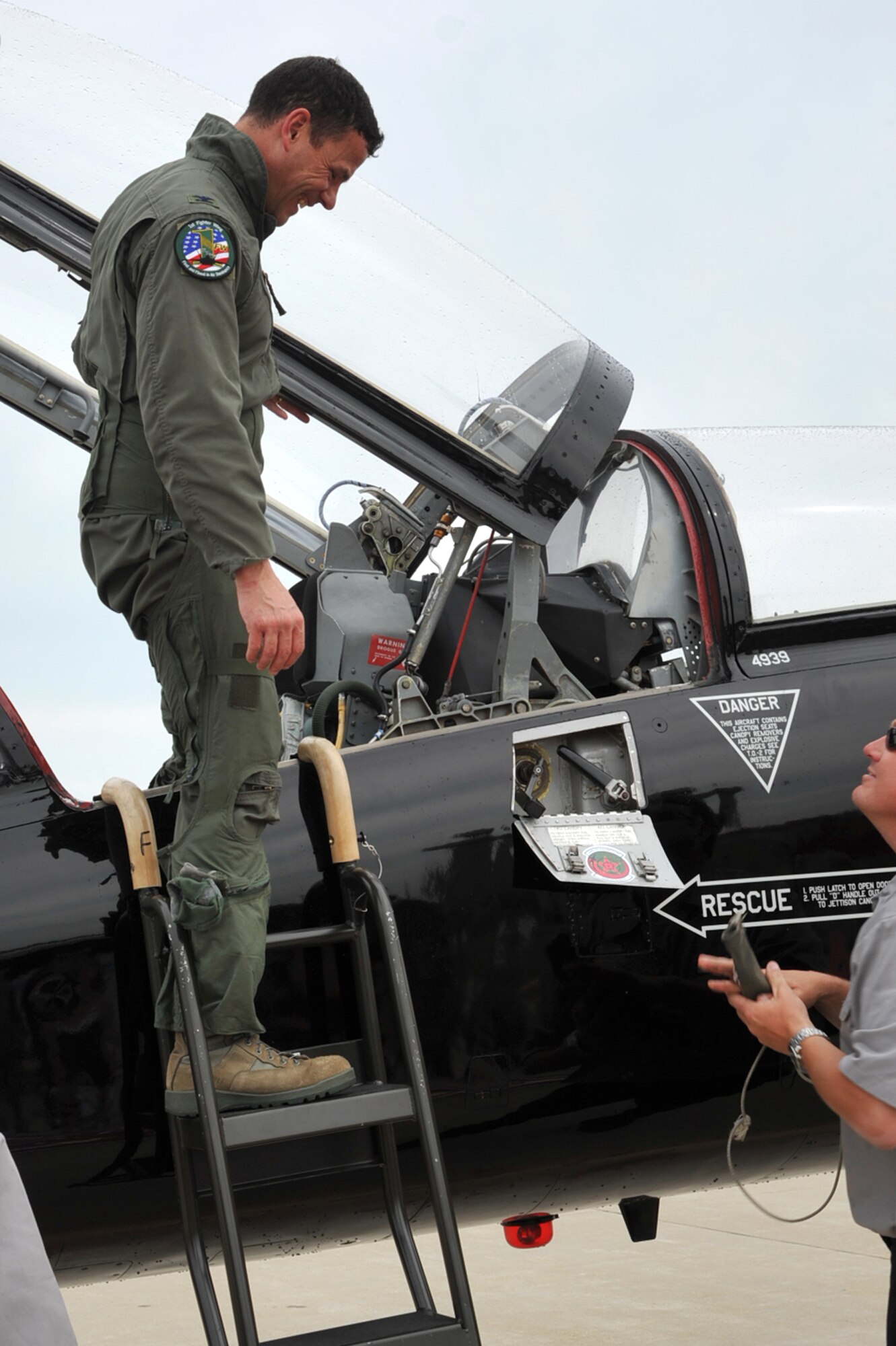 Col. Matthew Molloy, 1st Fighter Wing commander, exits a T-38 Talon after his fini-flight at Langley Air Force Base, Va., May 19, 2011. Colonel Molloy has more than 3,100 flying hours in the F-15 and F-22. (U.S. Air Force photo by Airman 1st Class Camilla Griffin)(RELEASED)