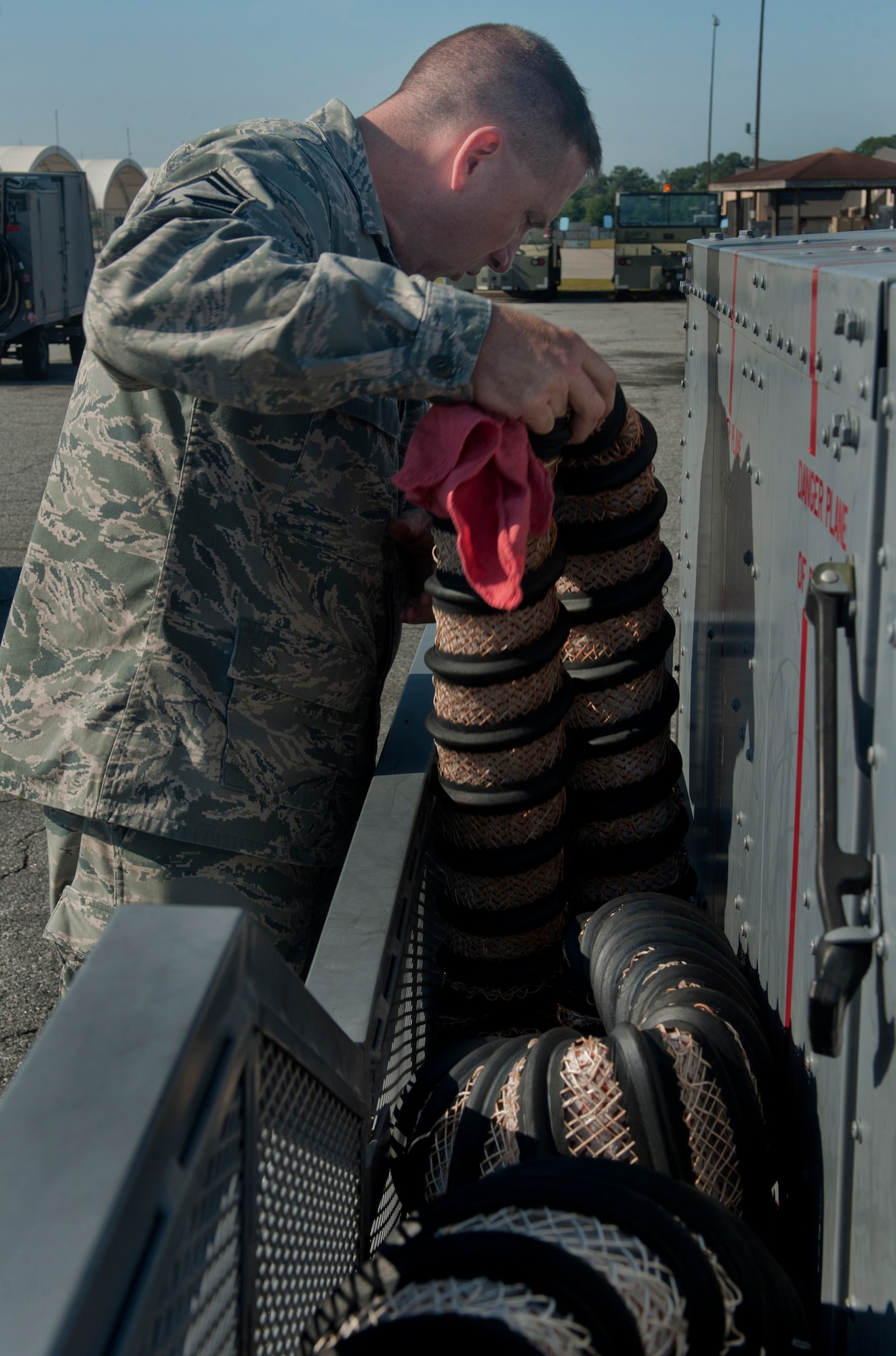 MOODY AIR FORCE BASE, Ga. -- Senior Master Sgt. Kenneth Myers, Air Combat Command aerospace ground equipment Logistics Compliance Assessment Program inspector, observes a turbine compressor bleed-air hose May 18. Moody Airmen have been preparing for the inspection since January. (U.S. Air Force photo/Airman 1st Class Douglas Ellis)(RELEAESED)
