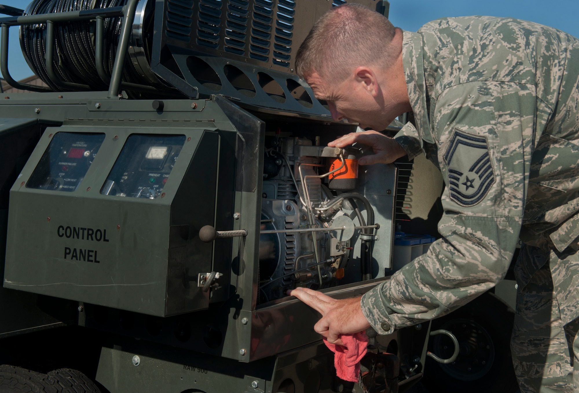 MOODY AIR FORCE BASE, Ga. -- Senior Master Sgt. Kenneth Myers, Air Combat Command aerospace ground equipment Logistics Compliance Assessment Program inspector, checks the serviceability of a new generation heater May 18. The LCAP inspection team is set to perform anywhere from 2,500 to 3,000 inspections in just four days. (U.S. Air Force photo/Airman 1st Class Douglas Ellis)(RELEAESED)
