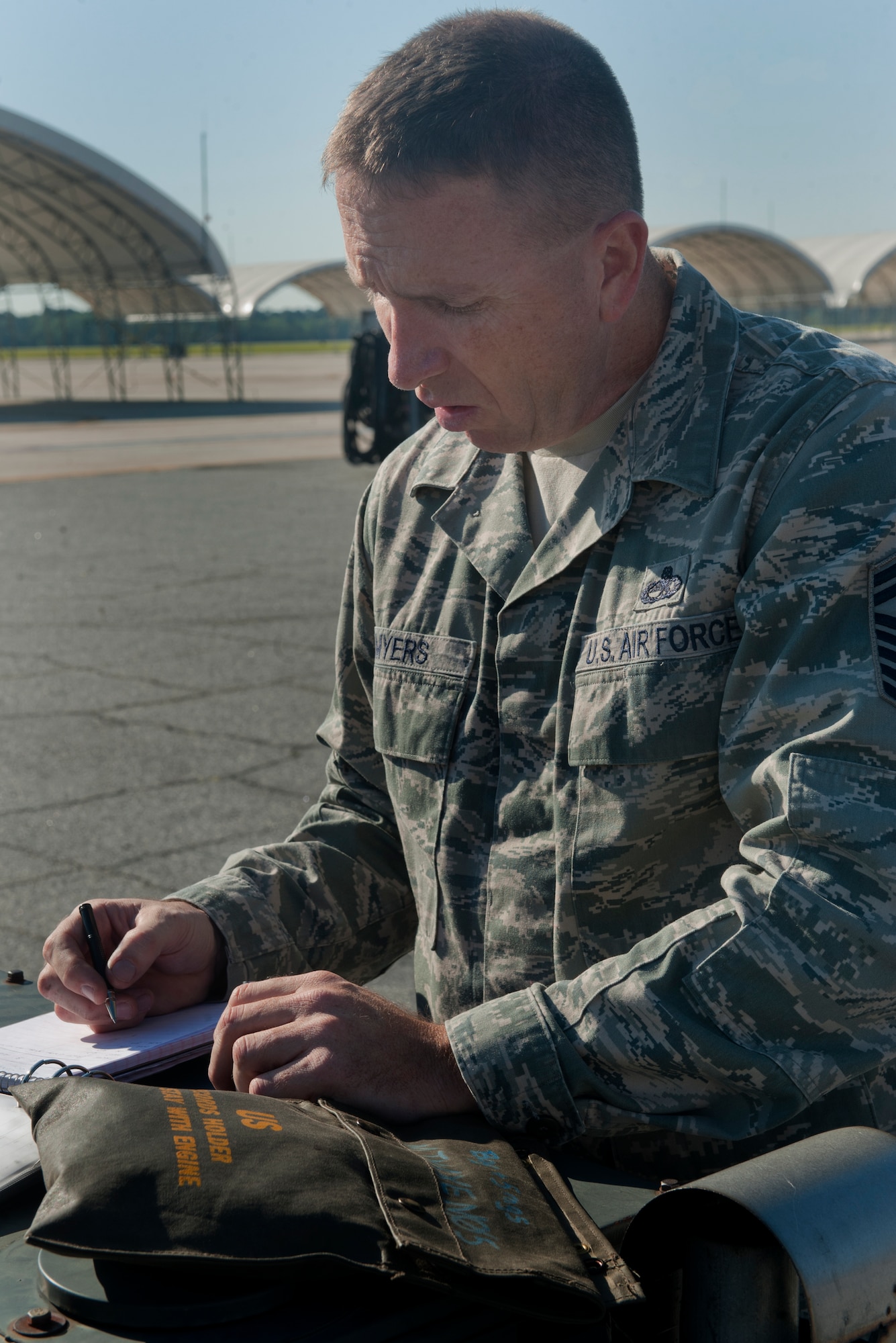 MOODY AIR FORCE BASE, Ga. -- Senior Master Sgt. Kenneth Myers, Air Combat Command aerospace ground equipment Logistics Compliance Assessment Program inspector, takes notes as he inspects multiple pieces of equipment May 18. An LCAP inspection is performed every two years, giving the base a grade on how well they performed and suggestions on improvements if needed. (U.S. Air Force photo/Airman 1st Class Douglas Ellis)(RELEAESED)

