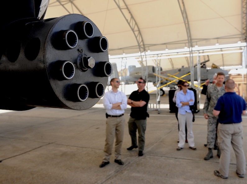 Congressional Staff members tour the A-10C Thunderbolt II aircraft parking ramp during their tour of Moody Air Force Base, Ga., May 17. Moody was the first stop on a four base tour. During their visit to the base, the staff members were able to see the combat, search and rescue assets that Moody provides for missions across the world. (U.S. Air Force photo/Airman 1st Class Benjamin Wiseman)(RELEASED)