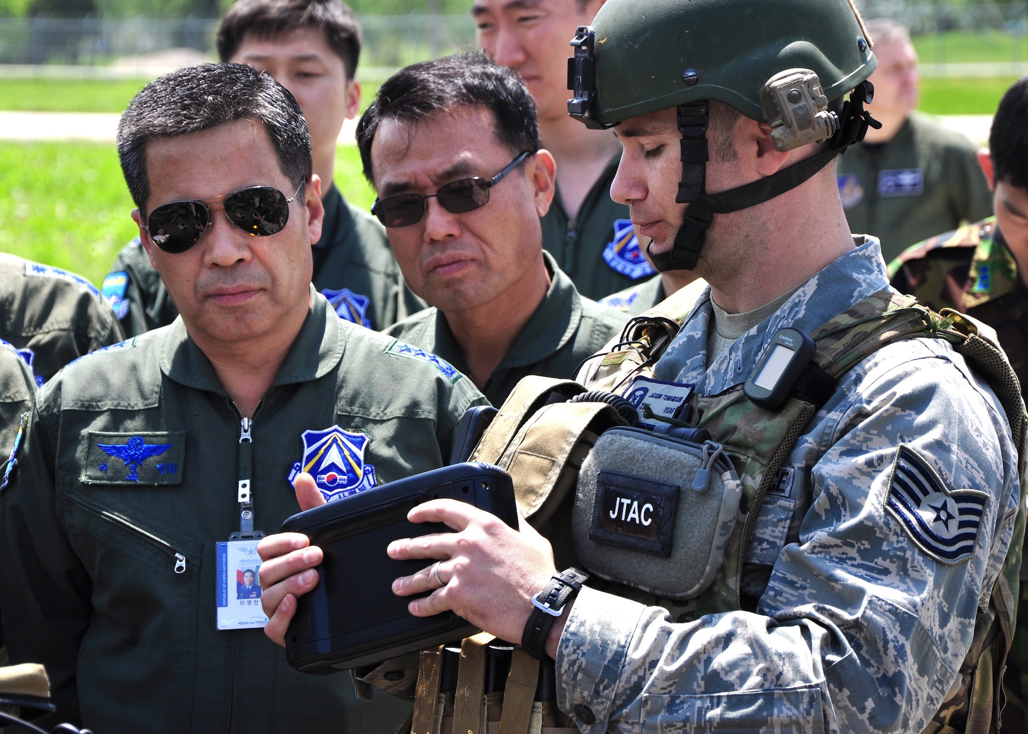 Joint terminal attack controllers showcase new digital capabilities during a recent demonstration with South Korea airmen at Osan Air Base, South Korea. The JTACS are assigned to the 607th Air Support Operations Group. (U.S. Air Force photo/Staff Sgt. Chad Thompson) 
